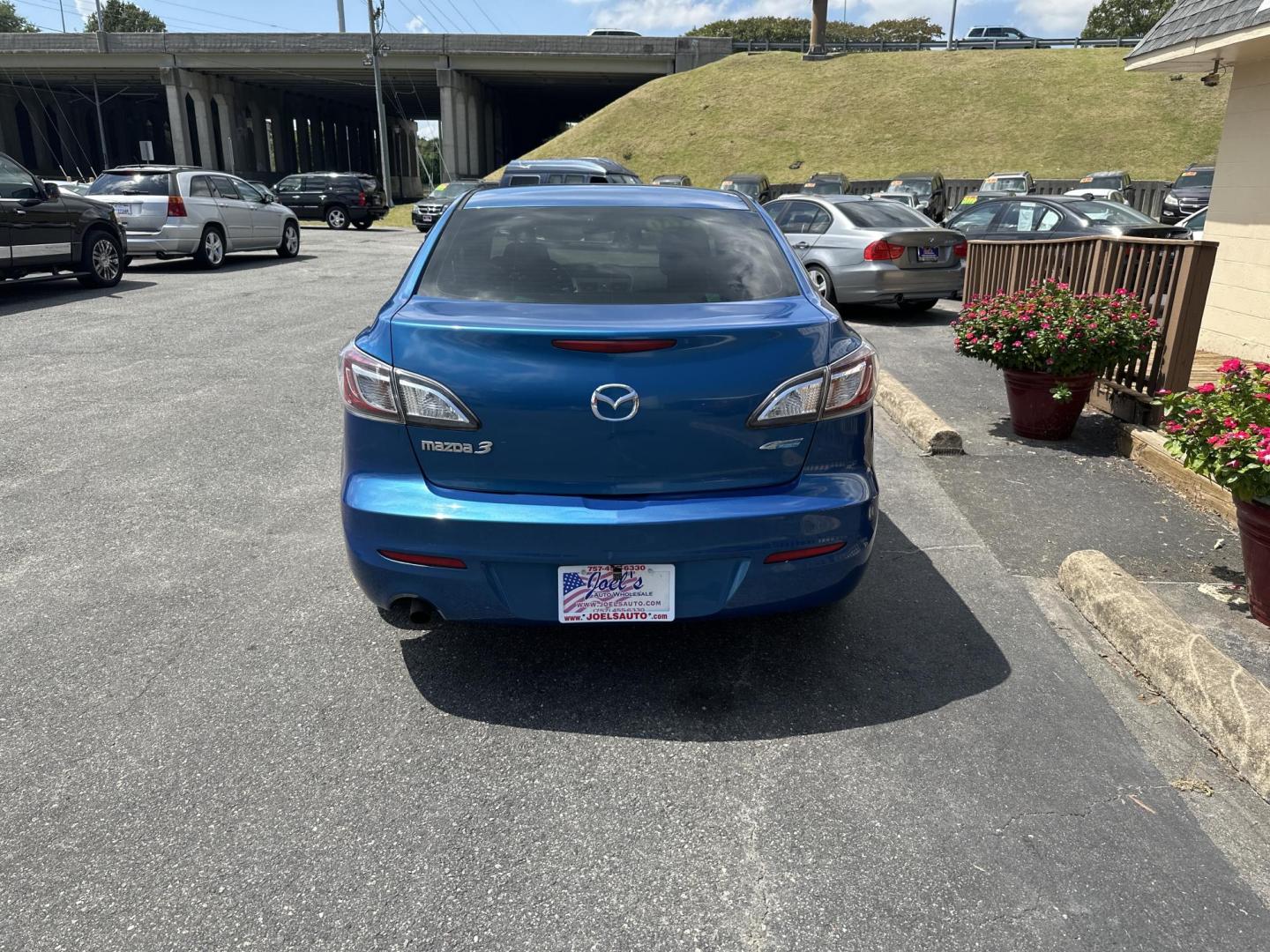 2012 Blue Mazda MAZDA3 (JM1BL1V7XC1) , located at 5700 Curlew Drive, Norfolk, VA, 23502, (757) 455-6330, 36.841885, -76.209412 - Photo#2
