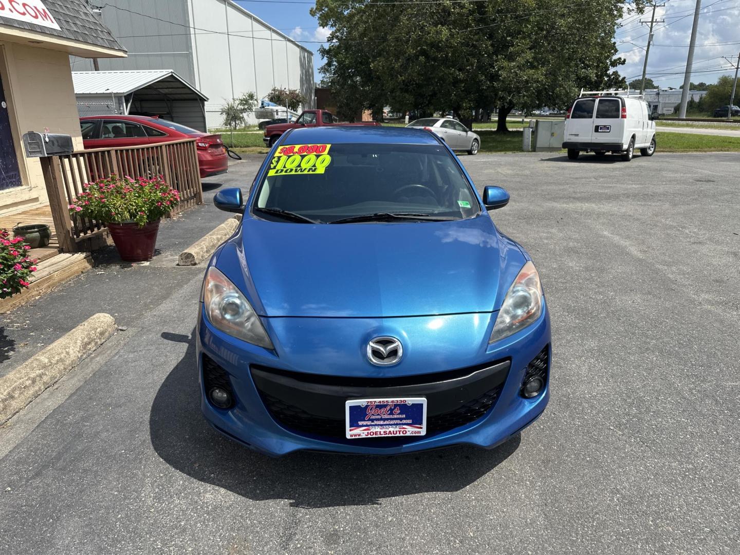 2012 Blue Mazda MAZDA3 (JM1BL1V7XC1) , located at 5700 Curlew Drive, Norfolk, VA, 23502, (757) 455-6330, 36.841885, -76.209412 - Photo#4