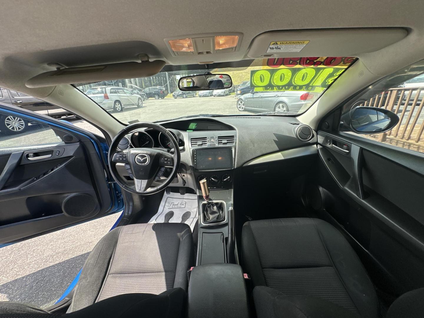 2012 Blue Mazda MAZDA3 (JM1BL1V7XC1) , located at 5700 Curlew Drive, Norfolk, VA, 23502, (757) 455-6330, 36.841885, -76.209412 - Photo#7