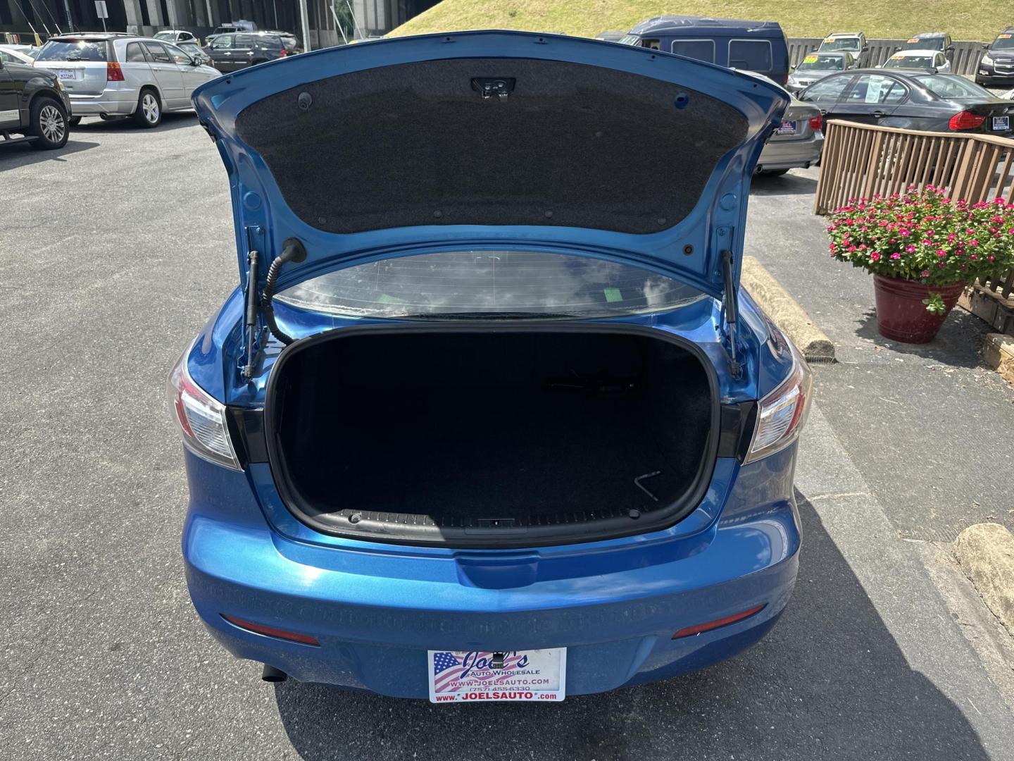 2012 Blue Mazda MAZDA3 (JM1BL1V7XC1) , located at 5700 Curlew Drive, Norfolk, VA, 23502, (757) 455-6330, 36.841885, -76.209412 - Photo#10