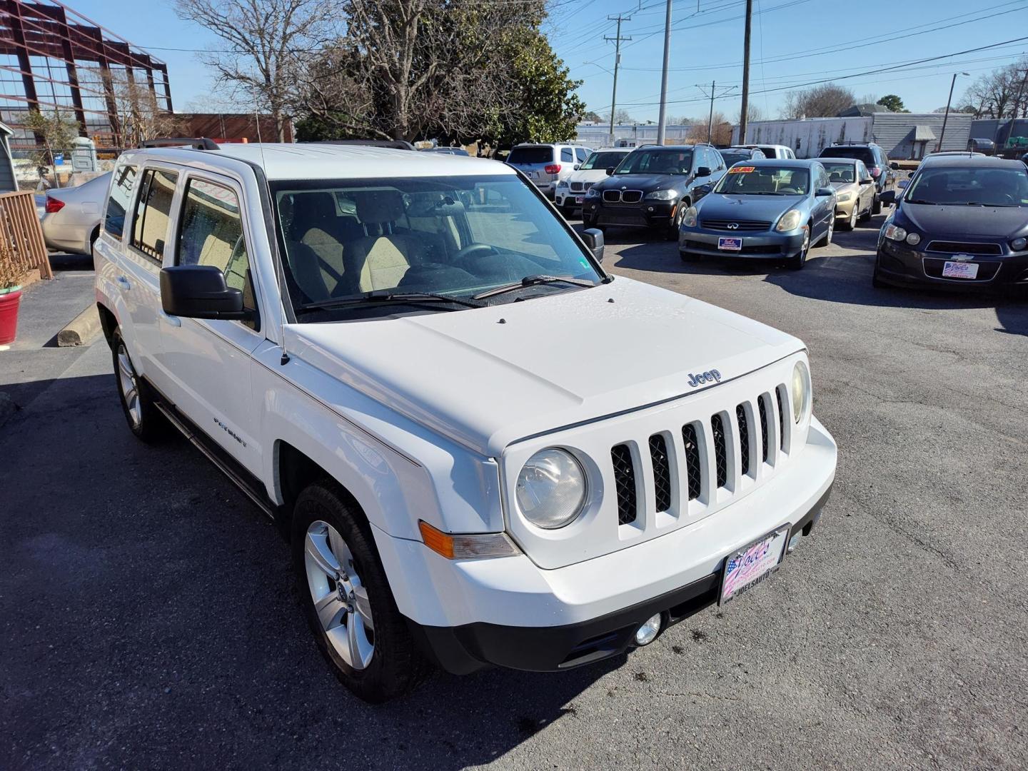 2013 WHITE Jeep Patriot Sport 4WD (1C4NJRBB9DD) with an 2.4L L4 DOHC 16V engine, located at 5700 Curlew Drive, Norfolk, VA, 23502, (757) 455-6330, 36.841885, -76.209412 - Photo#2