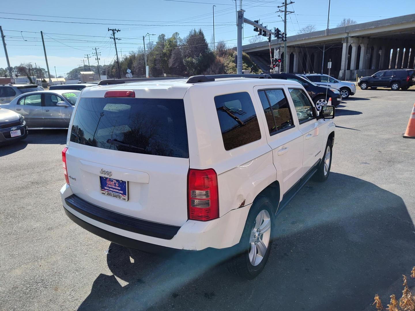 2013 WHITE Jeep Patriot Sport 4WD (1C4NJRBB9DD) with an 2.4L L4 DOHC 16V engine, located at 5700 Curlew Drive, Norfolk, VA, 23502, (757) 455-6330, 36.841885, -76.209412 - Photo#13