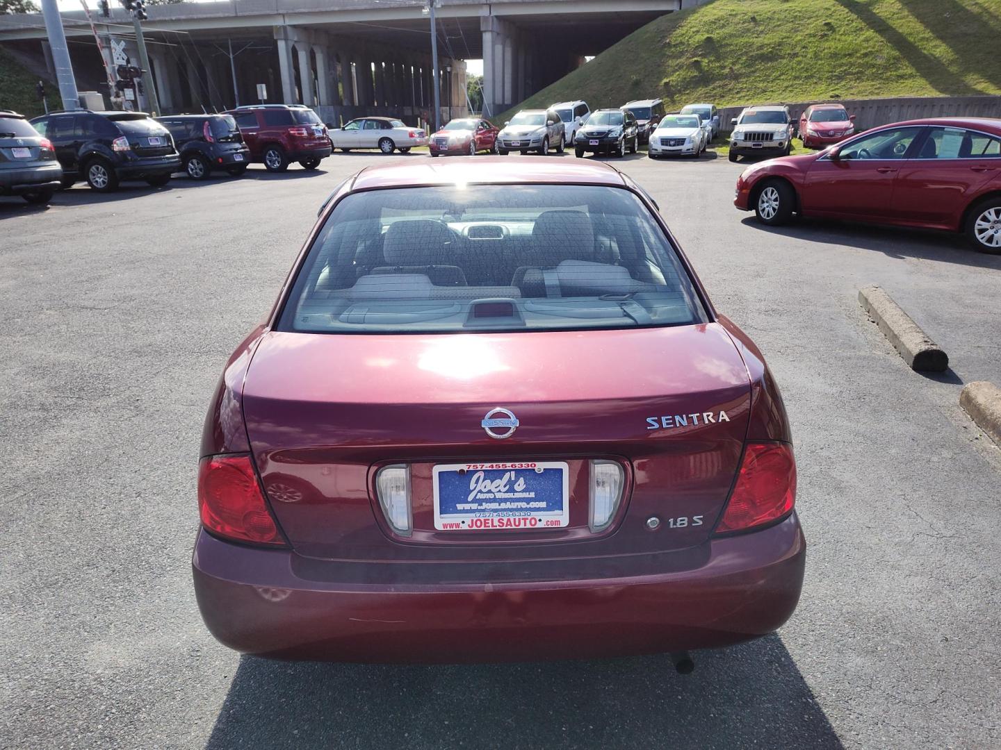 2004 Nissan Sentra 1.8 (3N1CB51DX4L) with an 1.8L L4 DOHC 16V engine, located at 5700 Curlew Drive, Norfolk, VA, 23502, (757) 455-6330, 36.841885, -76.209412 - Photo#9