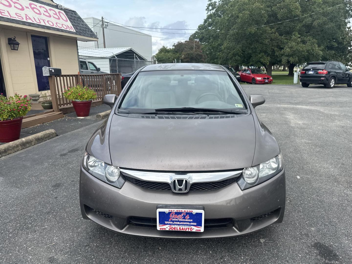 2010 Honda Civic LX Sedan 5-Speed AT (2HGFA1F57AH) with an 1.8L L4 SOHC 16V engine, 5-Speed Automatic transmission, located at 5700 Curlew Drive, Norfolk, VA, 23502, (757) 455-6330, 36.841885, -76.209412 - Photo#4