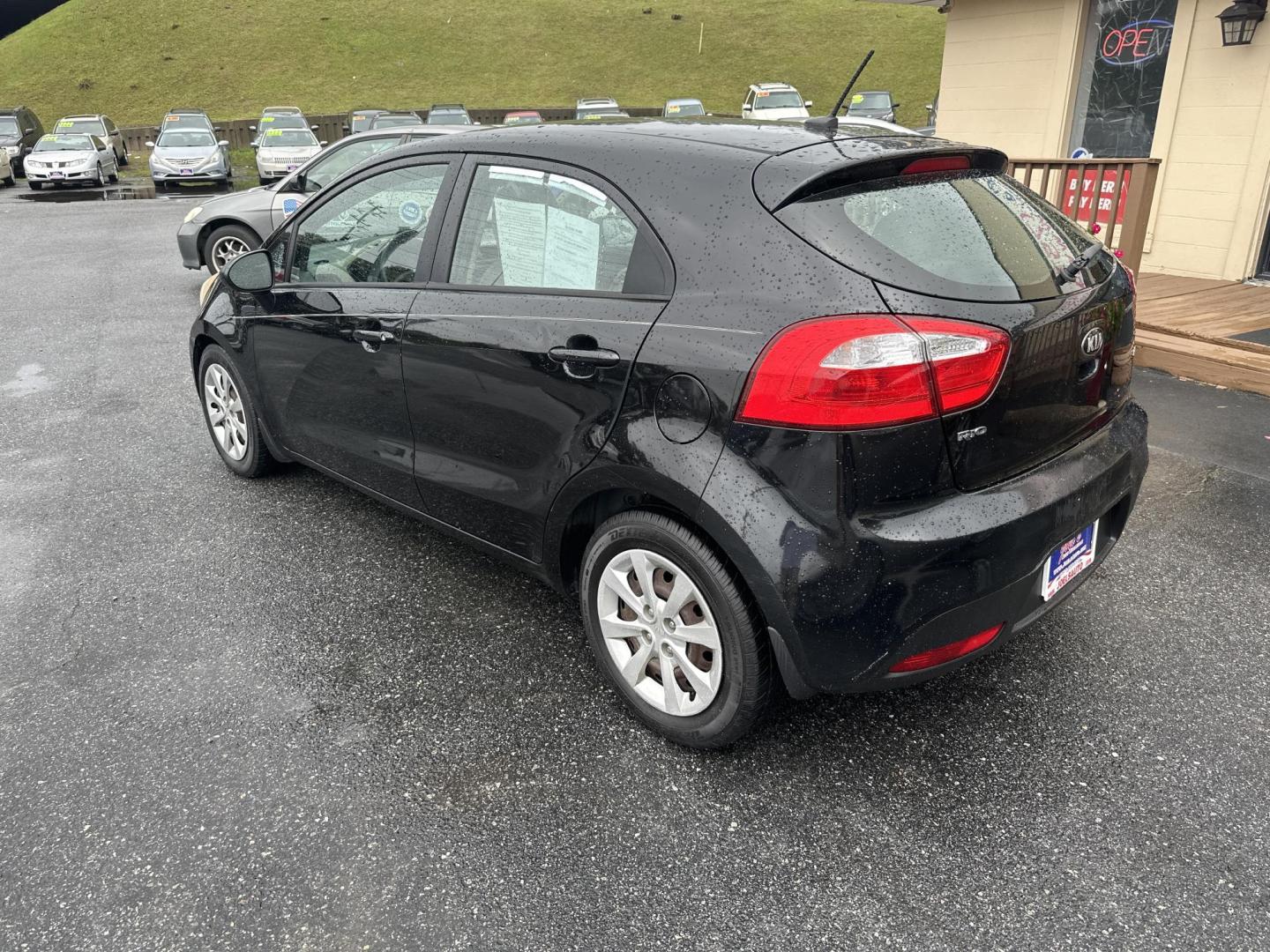 2015 Black Kia Rio5 LX 6A (KNADM5A35F6) with an 1.6L L4 DOHC 16V engine, 6-Speed Automatic transmission, located at 5700 Curlew Drive, Norfolk, VA, 23502, (757) 455-6330, 36.841885, -76.209412 - Photo#1