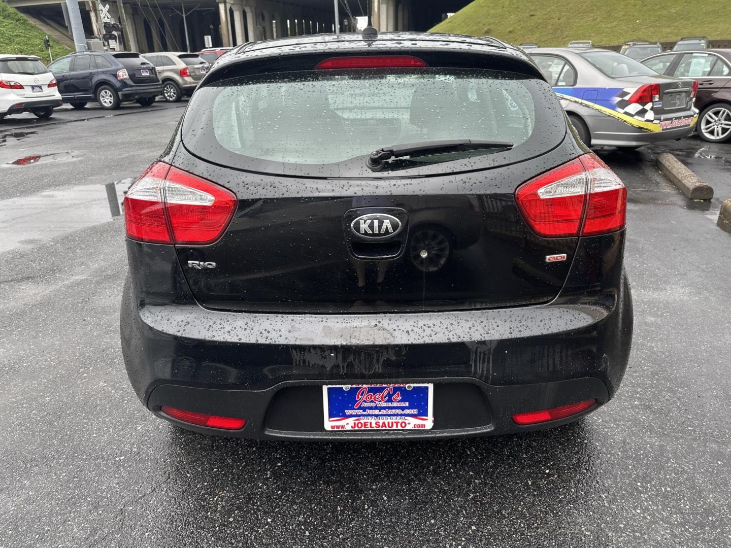 2015 Black Kia Rio5 LX 6A (KNADM5A35F6) with an 1.6L L4 DOHC 16V engine, 6-Speed Automatic transmission, located at 5700 Curlew Drive, Norfolk, VA, 23502, (757) 455-6330, 36.841885, -76.209412 - Photo#2