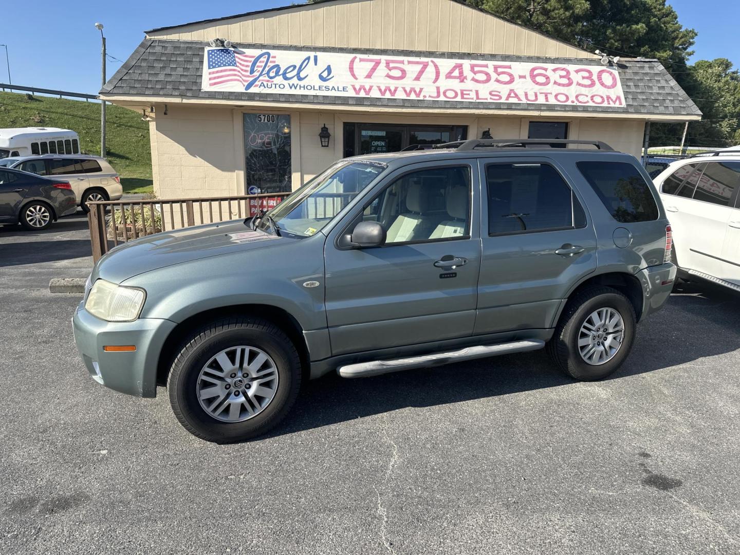 2007 Mercury Mariner Luxury 4WD (4M2CU91157K) with an 3.0L V6 DOHC 24V engine, 4-Speed Automatic transmission, located at 5700 Curlew Dr., Norfolk, VA, 23502, (703) 554-4373, 36.841885, -76.209412 - Photo#0