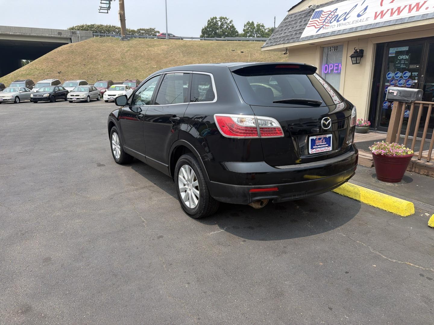 2010 Black Mazda CX-9 Grand Touring AWD (JM3TB3MV1A0) with an 3.7L V6 DOHC 24V engine, 6-Speed Automatic transmission, located at 5700 Curlew Drive, Norfolk, VA, 23502, (757) 455-6330, 36.841885, -76.209412- Photo#1