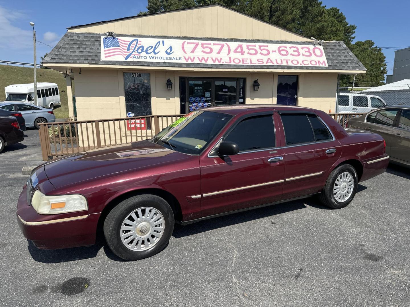 2007 Burgundy /Tan Mercury Grand Marquis LS Premium (2MEFM75VX7X) with an 4.6L V8 OHC 16V FFV engine, 4-Speed Automatic Overdrive transmission, located at 5700 Curlew Drive, Norfolk, VA, 23502, (757) 455-6330, 36.841885, -76.209412 - Photo#0