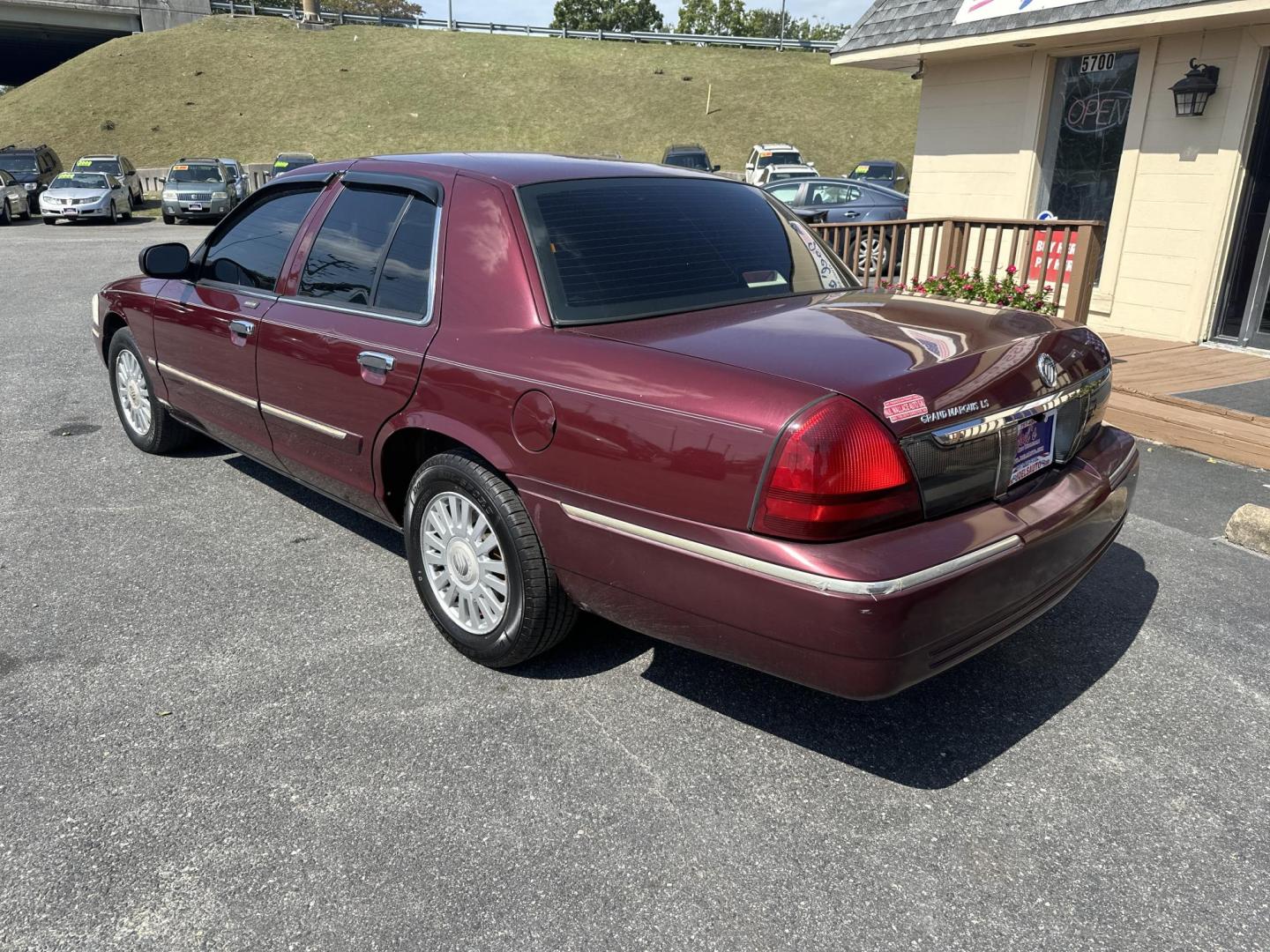 2007 Burgundy /Tan Mercury Grand Marquis LS Premium (2MEFM75VX7X) with an 4.6L V8 OHC 16V FFV engine, 4-Speed Automatic Overdrive transmission, located at 5700 Curlew Drive, Norfolk, VA, 23502, (757) 455-6330, 36.841885, -76.209412 - Photo#1