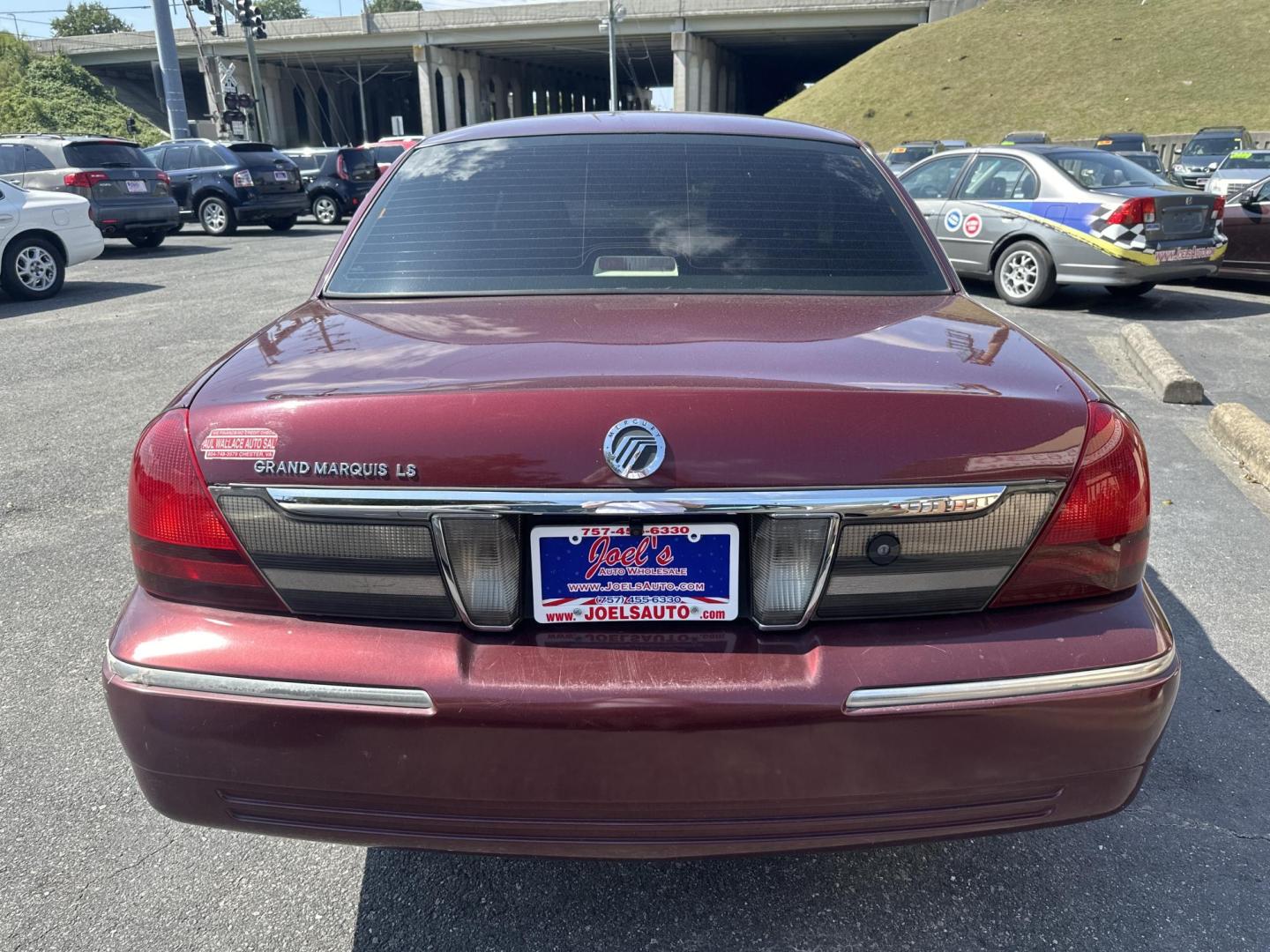 2007 Burgundy /Tan Mercury Grand Marquis LS Premium (2MEFM75VX7X) with an 4.6L V8 OHC 16V FFV engine, 4-Speed Automatic Overdrive transmission, located at 5700 Curlew Drive, Norfolk, VA, 23502, (757) 455-6330, 36.841885, -76.209412 - Photo#2