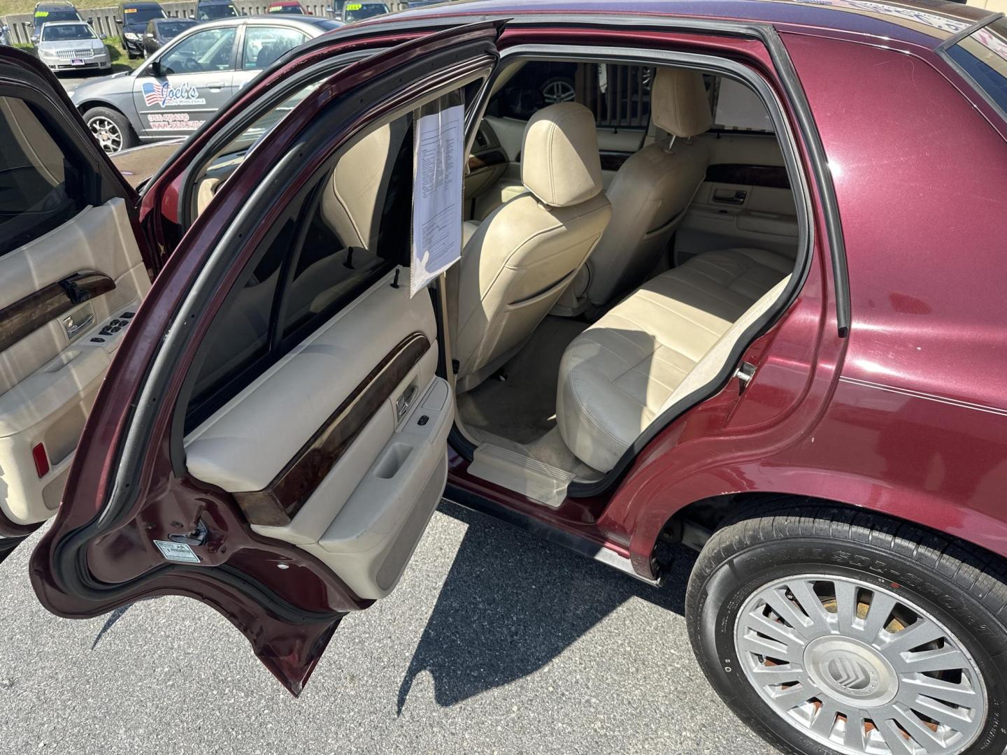 2007 Burgundy /Tan Mercury Grand Marquis LS Premium (2MEFM75VX7X) with an 4.6L V8 OHC 16V FFV engine, 4-Speed Automatic Overdrive transmission, located at 5700 Curlew Drive, Norfolk, VA, 23502, (757) 455-6330, 36.841885, -76.209412 - Photo#7