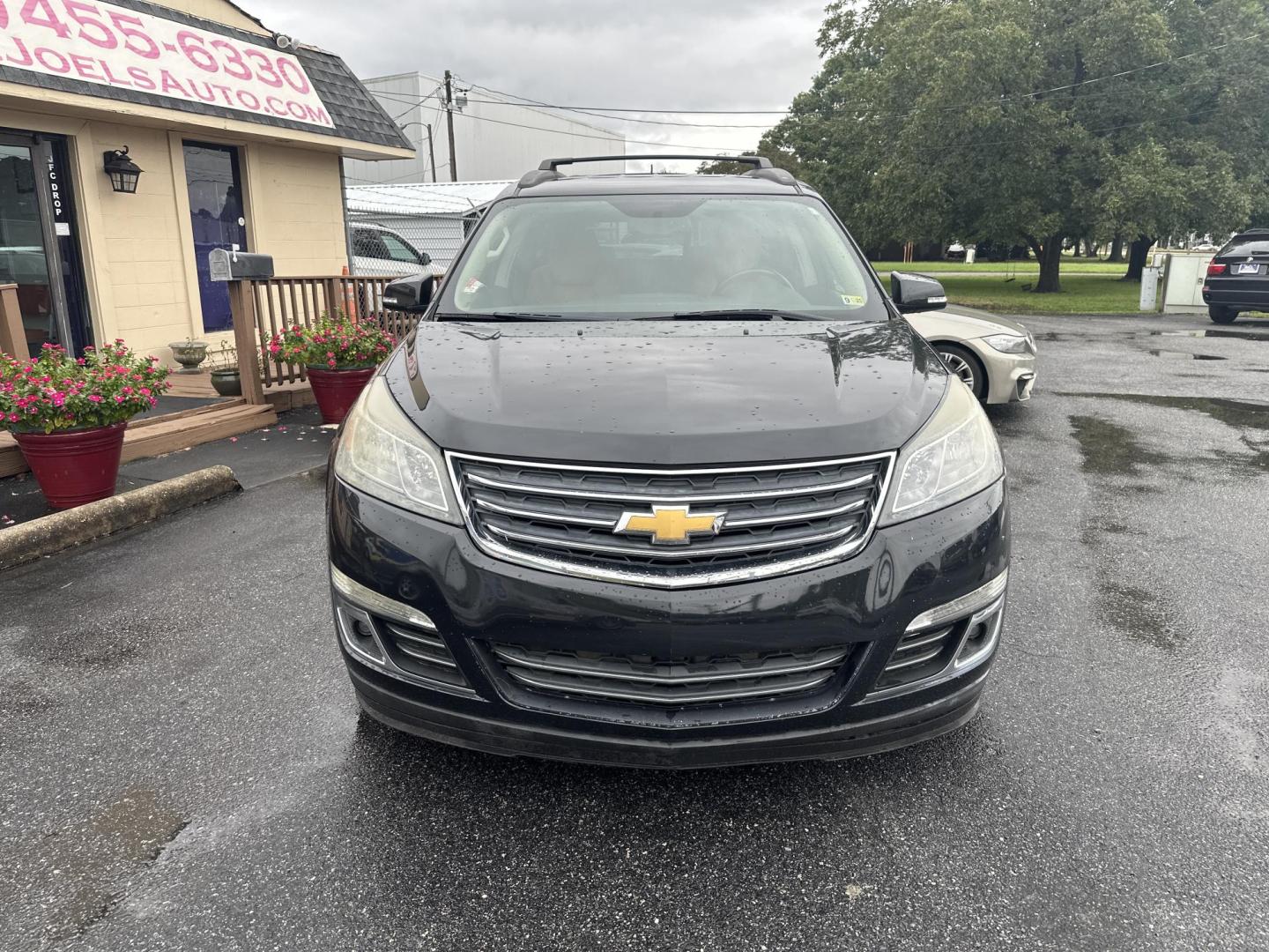 2013 Black Chevrolet Traverse LTZ AWD (1GNKVLKD5DJ) with an 3.6L V6 DOHC 24V engine, 6-Speed Automatic transmission, located at 5700 Curlew Drive, Norfolk, VA, 23502, (757) 455-6330, 36.841885, -76.209412 - Photo#4