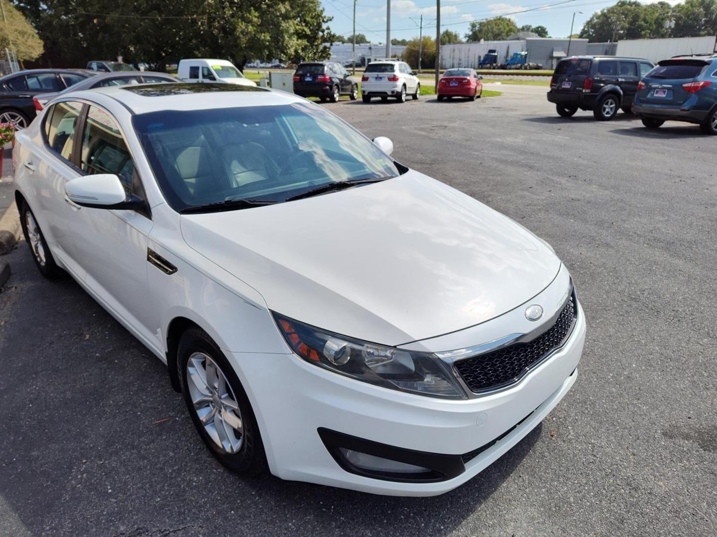 2013 WHITE Kia Optima LX MT (KNAGM4A79D5) with an 2.4L L4 DOHC 16V engine, 6-Speed Manual transmission, located at 5700 Curlew Drive, Norfolk, VA, 23502, (757) 455-6330, 36.841885, -76.209412 - Photo#4