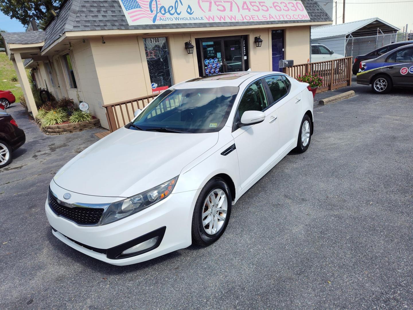 2013 WHITE Kia Optima LX MT (KNAGM4A79D5) with an 2.4L L4 DOHC 16V engine, 6-Speed Manual transmission, located at 5700 Curlew Drive, Norfolk, VA, 23502, (757) 455-6330, 36.841885, -76.209412 - Photo#0