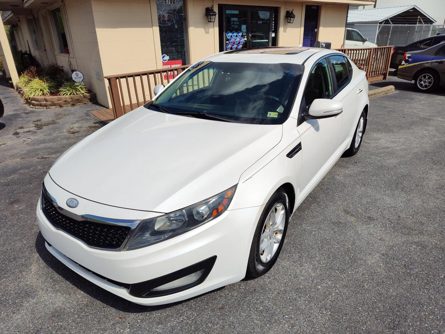 2013 WHITE Kia Optima LX MT (KNAGM4A79D5) with an 2.4L L4 DOHC 16V engine, 6-Speed Manual transmission, located at 5700 Curlew Drive, Norfolk, VA, 23502, (757) 455-6330, 36.841885, -76.209412 - Photo#5