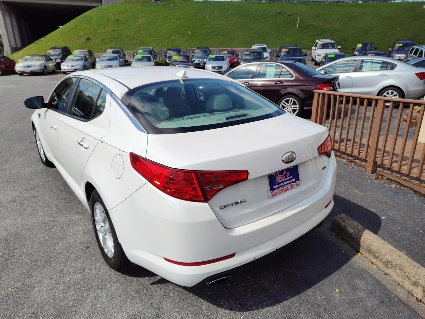 2013 WHITE Kia Optima LX MT (KNAGM4A79D5) with an 2.4L L4 DOHC 16V engine, 6-Speed Manual transmission, located at 5700 Curlew Drive, Norfolk, VA, 23502, (757) 455-6330, 36.841885, -76.209412 - Photo#10