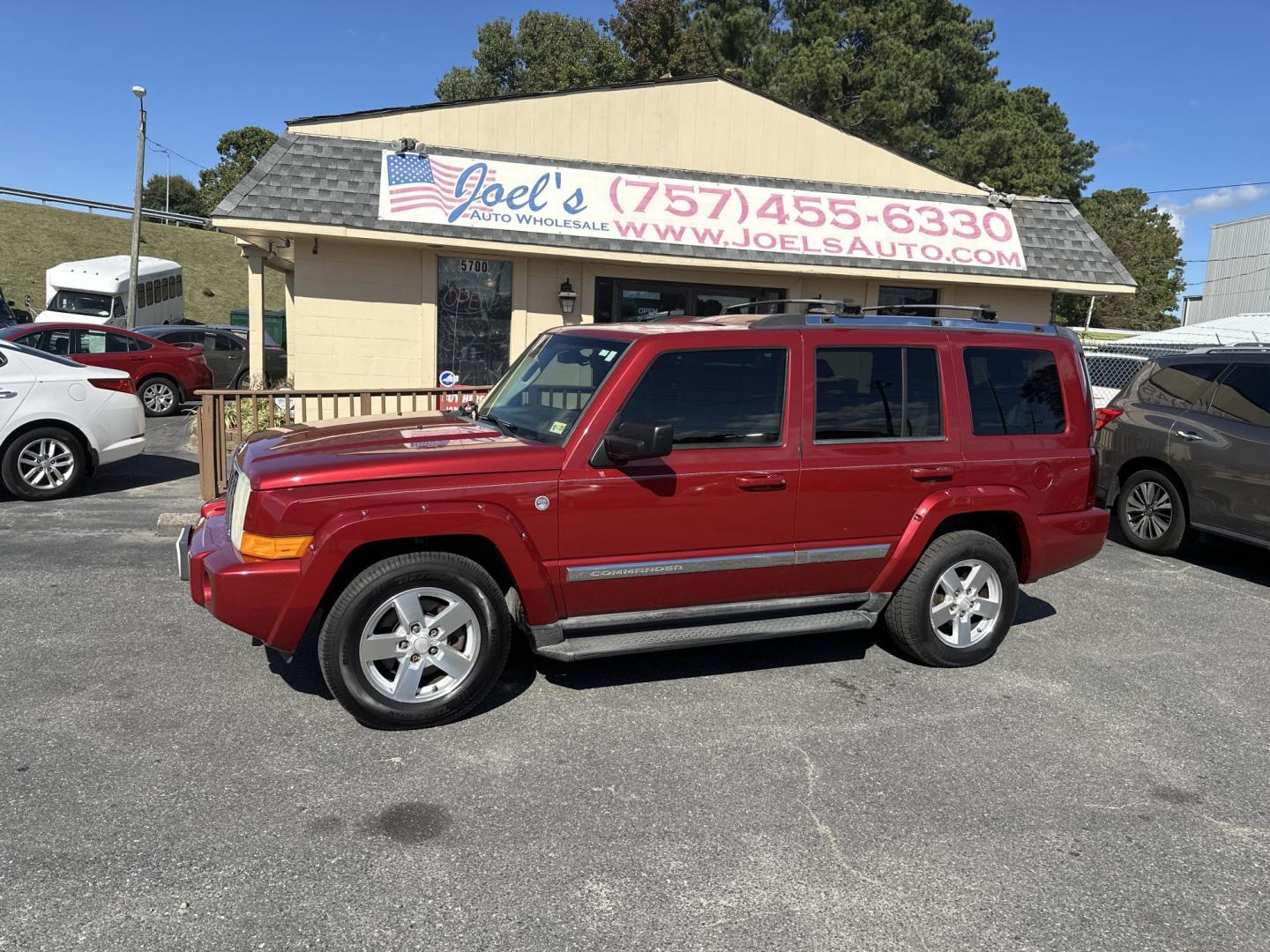 2006 Red Jeep Commander Limited 4WD (1J8HG58N76C) with an 4.7L V8 SOHC 16V engine, 5-Speed Automatic Overdrive transmission, located at 5700 Curlew Drive, Norfolk, VA, 23502, (757) 455-6330, 36.841885, -76.209412 - Photo#0