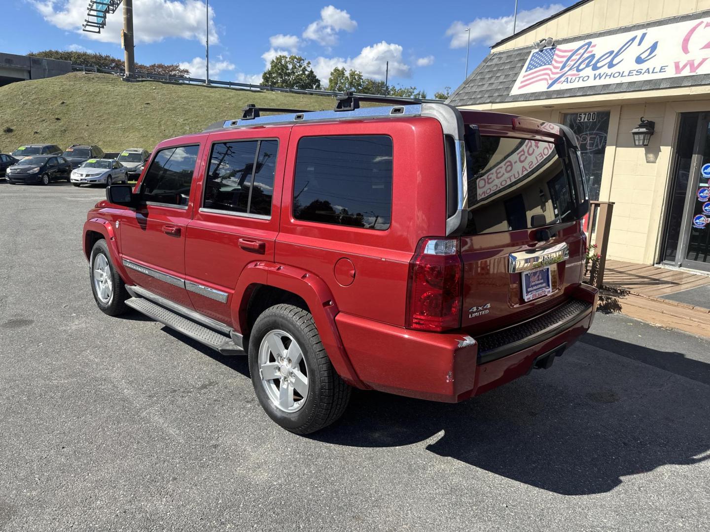 2006 Red Jeep Commander Limited 4WD (1J8HG58N76C) with an 4.7L V8 SOHC 16V engine, 5-Speed Automatic Overdrive transmission, located at 5700 Curlew Drive, Norfolk, VA, 23502, (757) 455-6330, 36.841885, -76.209412 - Photo#1