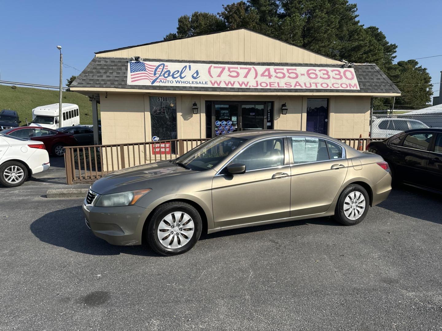 2008 Gold Honda Accord LX Sedan (1HGCP25308A) with an 2.4L L4 DOHC 16V engine, 5-Speed Manual Overdrive transmission, located at 5700 Curlew Drive, Norfolk, VA, 23502, (757) 455-6330, 36.841885, -76.209412 - Photo#0