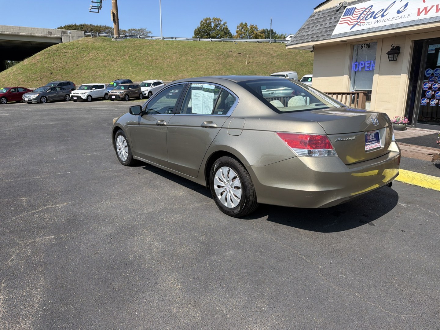 2008 Gold Honda Accord LX Sedan (1HGCP25308A) with an 2.4L L4 DOHC 16V engine, 5-Speed Manual Overdrive transmission, located at 5700 Curlew Drive, Norfolk, VA, 23502, (757) 455-6330, 36.841885, -76.209412- Photo#1