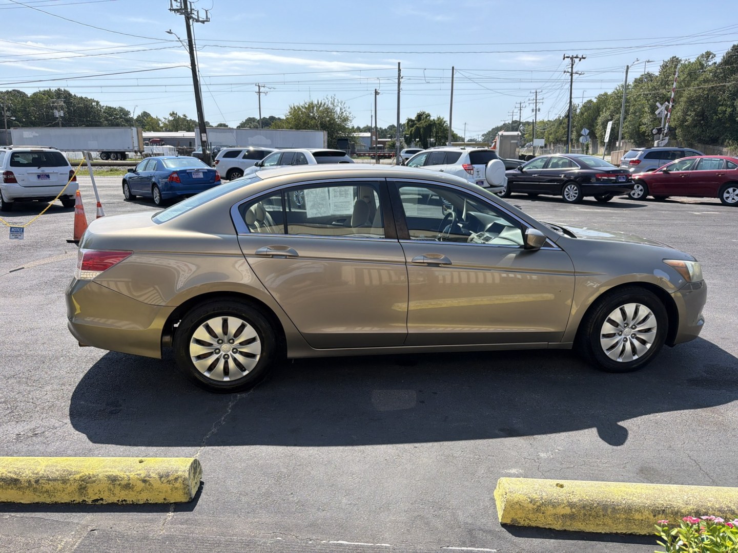2008 Gold Honda Accord LX Sedan (1HGCP25308A) with an 2.4L L4 DOHC 16V engine, 5-Speed Manual Overdrive transmission, located at 5700 Curlew Drive, Norfolk, VA, 23502, (757) 455-6330, 36.841885, -76.209412- Photo#3