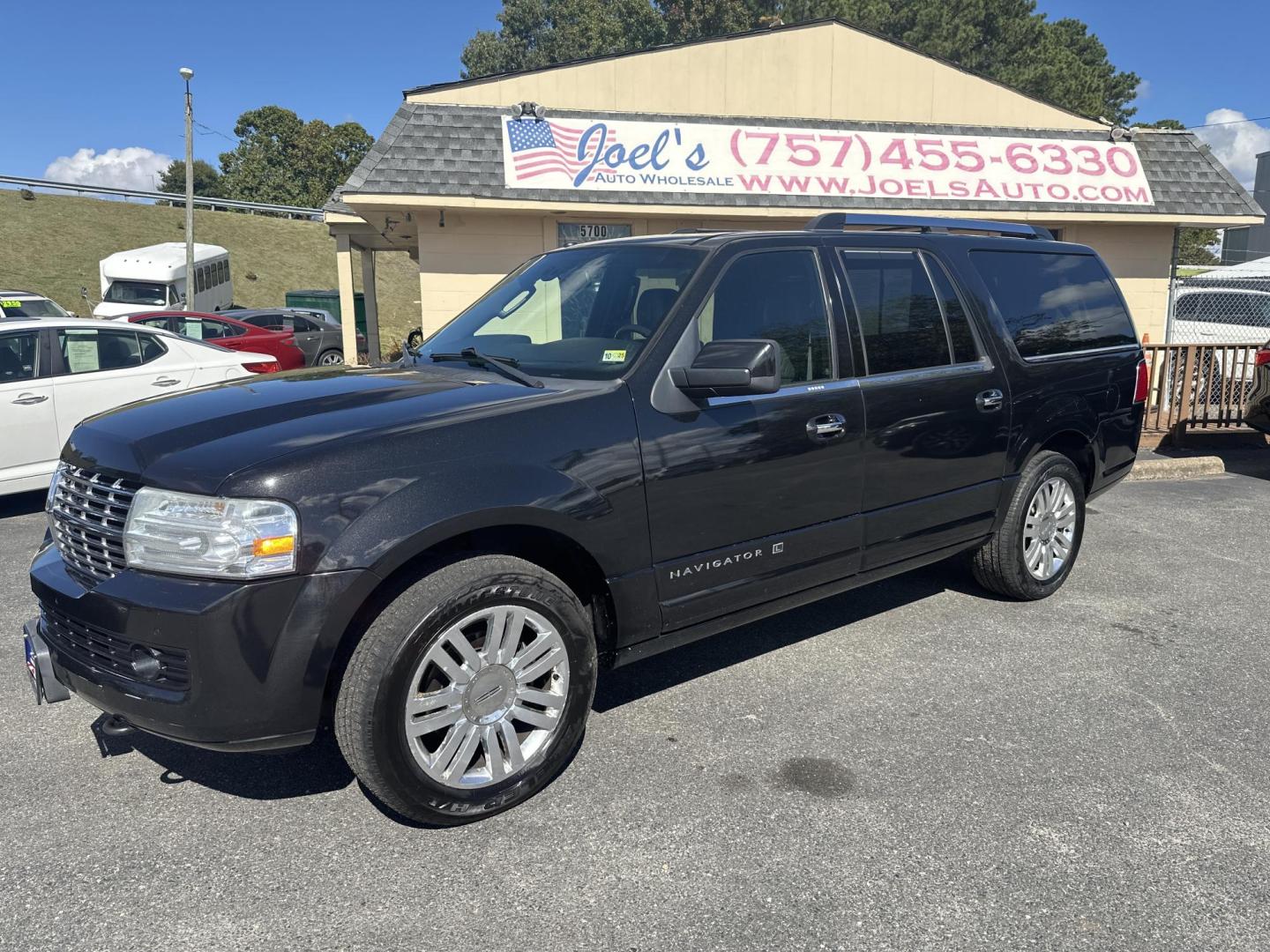 2012 Black Lincoln Navigator L 4WD (5LMJJ3J54CE) with an 5.4L V8 SOHC 24V engine, 6-Speed Automatic transmission, located at 5700 Curlew Drive, Norfolk, VA, 23502, (757) 455-6330, 36.841885, -76.209412 - Photo#0