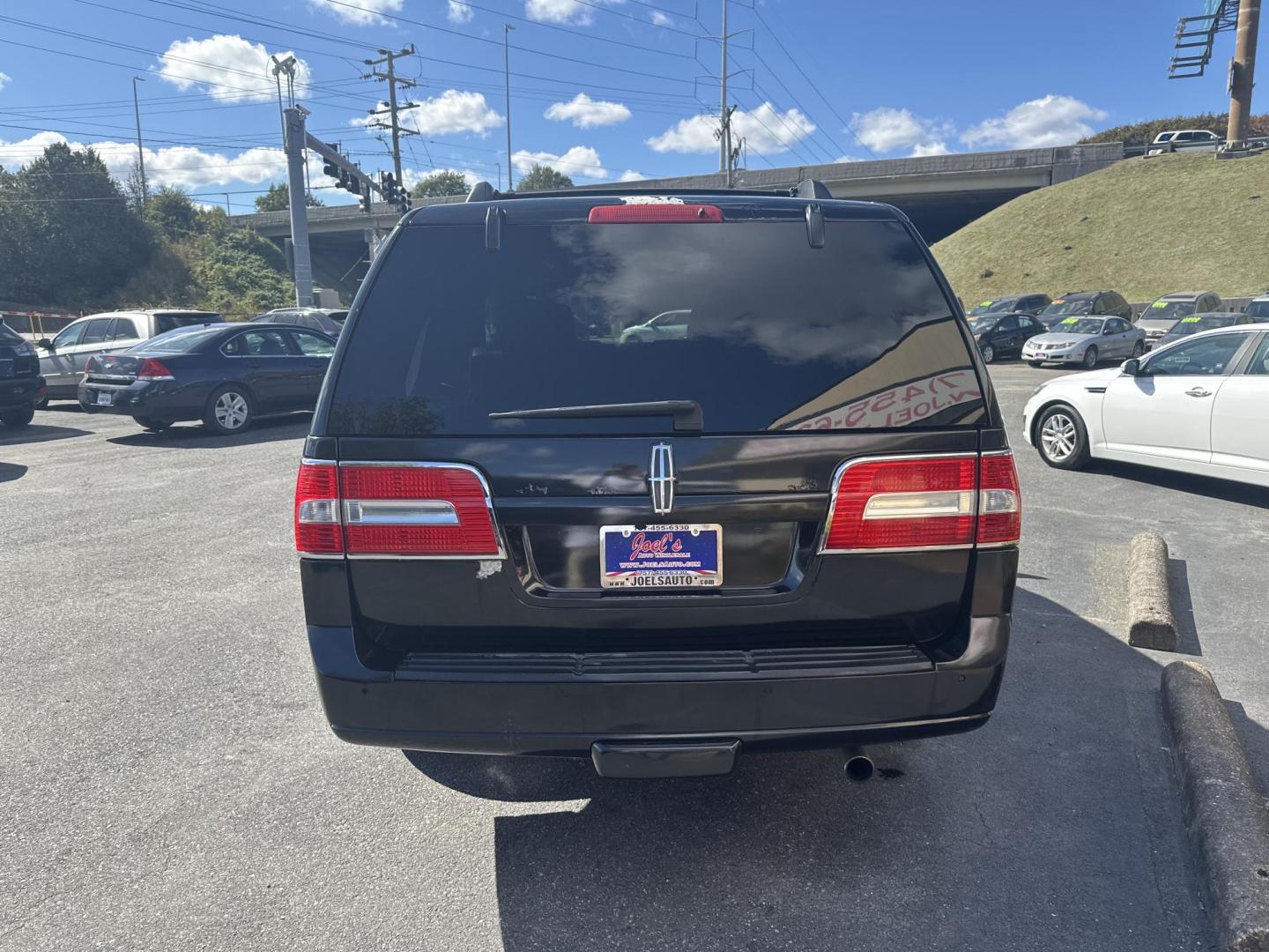 2012 Black Lincoln Navigator L 4WD (5LMJJ3J54CE) with an 5.4L V8 SOHC 24V engine, 6-Speed Automatic transmission, located at 5700 Curlew Drive, Norfolk, VA, 23502, (757) 455-6330, 36.841885, -76.209412 - Photo#2