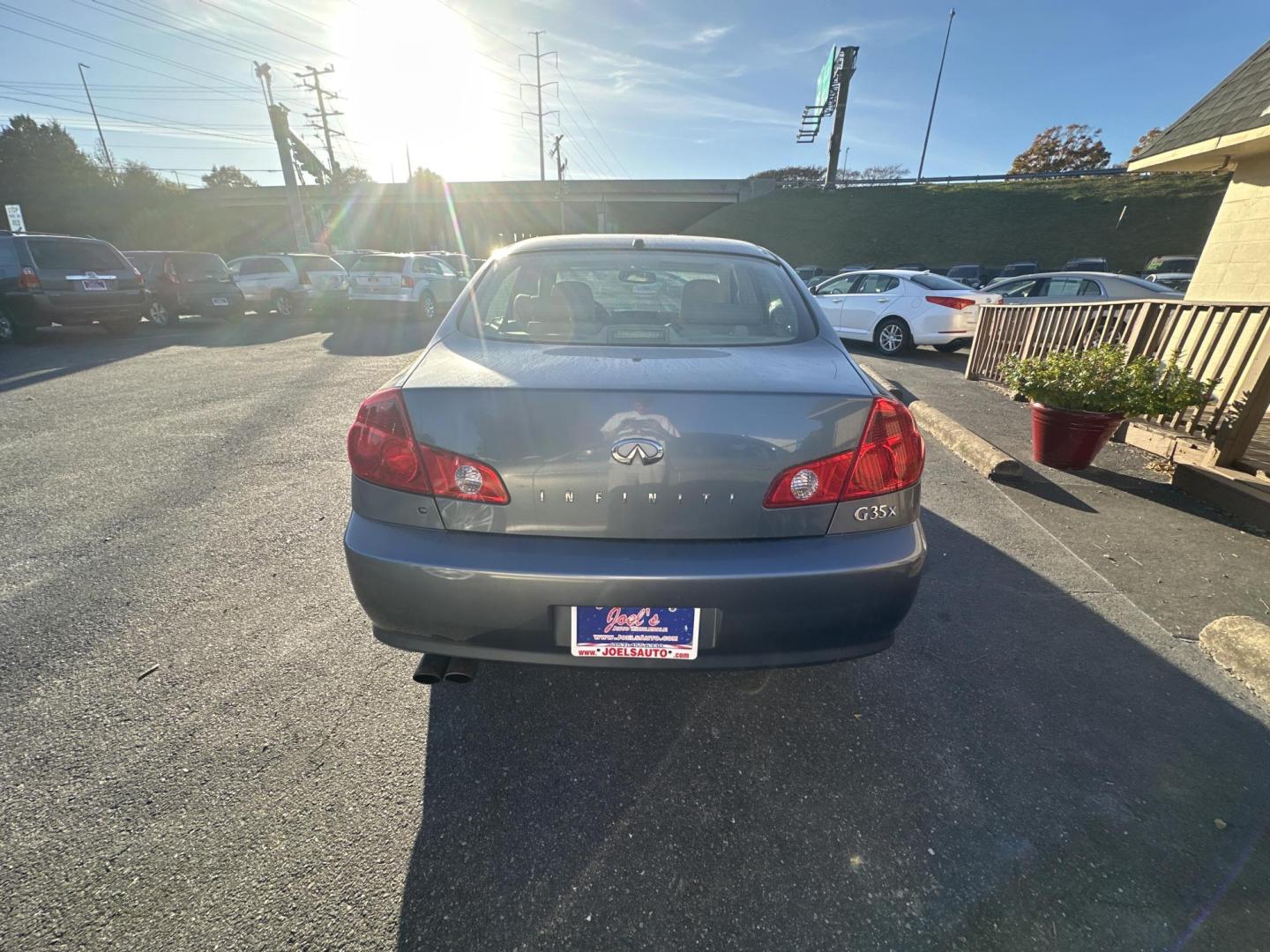 2006 Blue Infiniti G35 Sedan x AWD (JNKCV51F16M) with an 3.5L V6 DOHC 24V engine, 5-Speed Automatic Overdrive transmission, located at 5700 Curlew Drive, Norfolk, VA, 23502, (757) 455-6330, 36.841885, -76.209412 - Photo#2