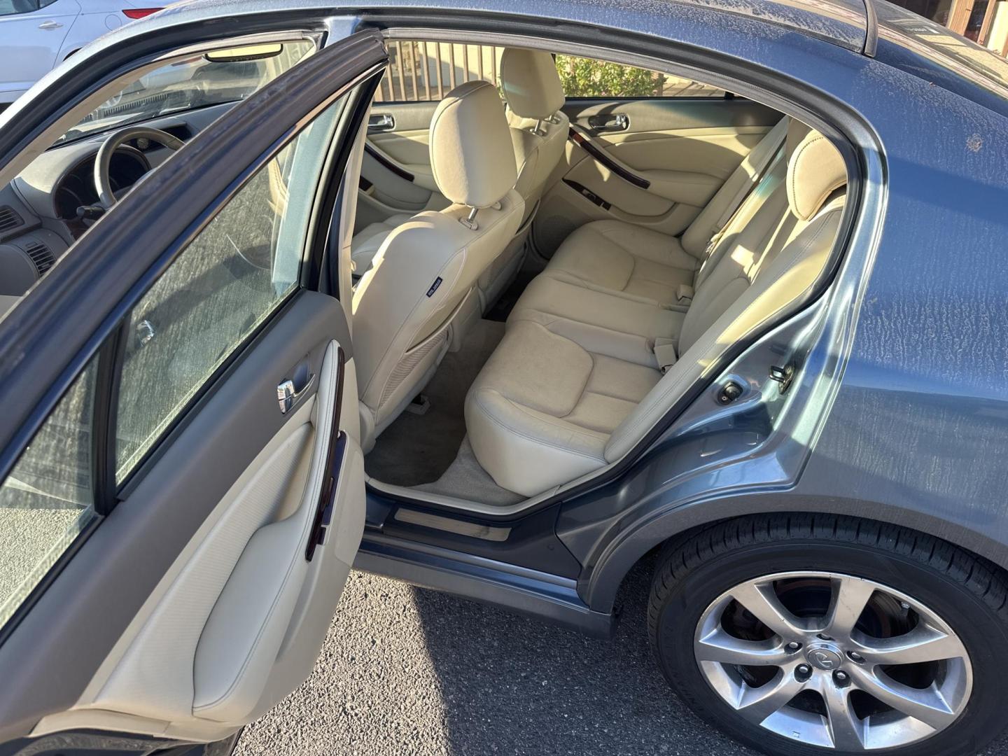 2006 Blue Infiniti G35 Sedan x AWD (JNKCV51F16M) with an 3.5L V6 DOHC 24V engine, 5-Speed Automatic Overdrive transmission, located at 5700 Curlew Drive, Norfolk, VA, 23502, (757) 455-6330, 36.841885, -76.209412 - Photo#8