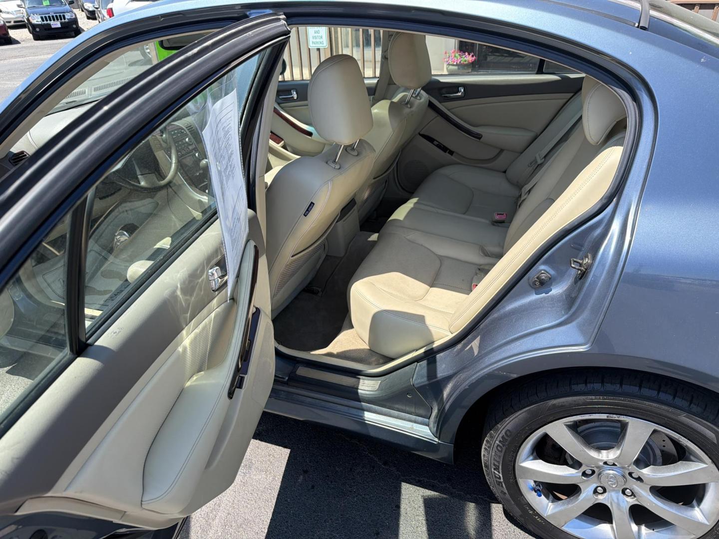2006 Blue Infiniti G35 Sedan x AWD (JNKCV51F16M) with an 3.5L V6 DOHC 24V engine, 5-Speed Automatic Overdrive transmission, located at 5700 Curlew Drive, Norfolk, VA, 23502, (757) 455-6330, 36.841885, -76.209412 - Photo#7