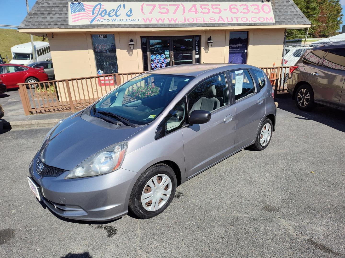 2009 Silver Honda Fit 5-Speed AT (JHMGE88209S) with an 1.5L L4 SOHC 16V engine, 5-Speed Automatic transmission, located at 5700 Curlew Drive, Norfolk, VA, 23502, (757) 455-6330, 36.841885, -76.209412 - Photo#0