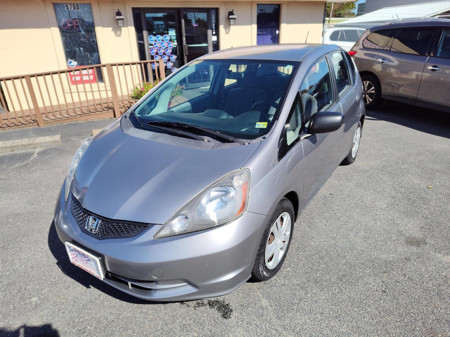 2009 Silver Honda Fit 5-Speed AT (JHMGE88209S) with an 1.5L L4 SOHC 16V engine, 5-Speed Automatic transmission, located at 5700 Curlew Drive, Norfolk, VA, 23502, (757) 455-6330, 36.841885, -76.209412 - Photo#5