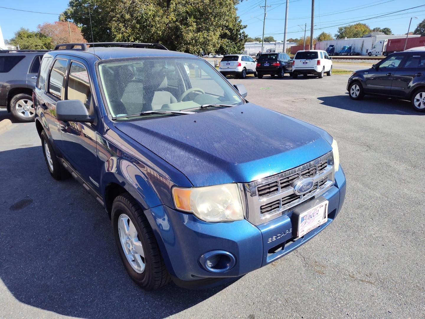 2008 Blue Ford Escape XLS 2WD AT (1FMCU02Z58K) with an 2.3L L4 DOHC 16V engine, 4-Speed Automatic Overdrive transmission, located at 5700 Curlew Drive, Norfolk, VA, 23502, (757) 455-6330, 36.841885, -76.209412 - Photo#4