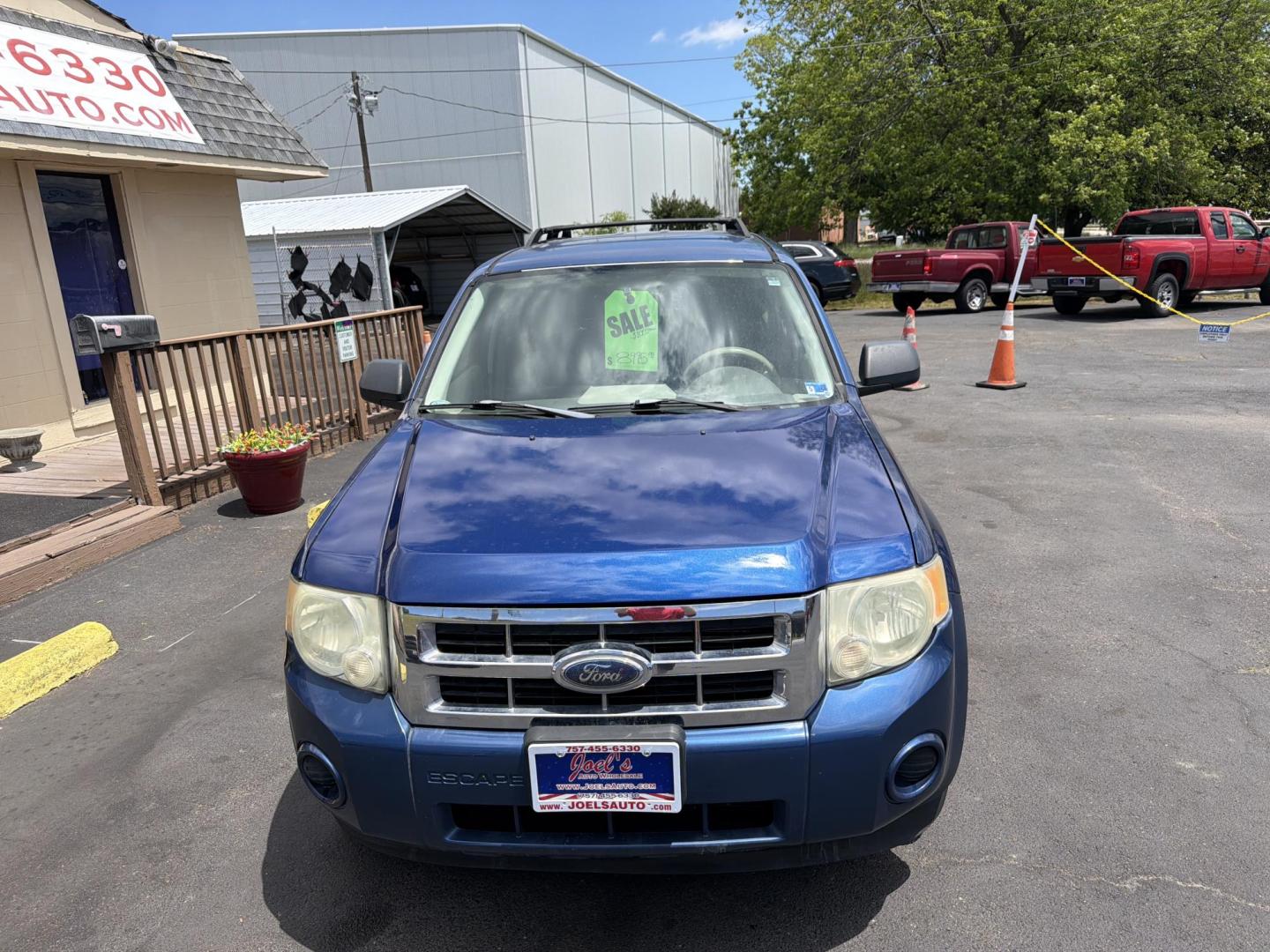 2008 Blue Ford Escape XLS 2WD AT (1FMCU02Z58K) with an 2.3L L4 DOHC 16V engine, 4-Speed Automatic Overdrive transmission, located at 5700 Curlew Drive, Norfolk, VA, 23502, (757) 455-6330, 36.841885, -76.209412 - Photo#4