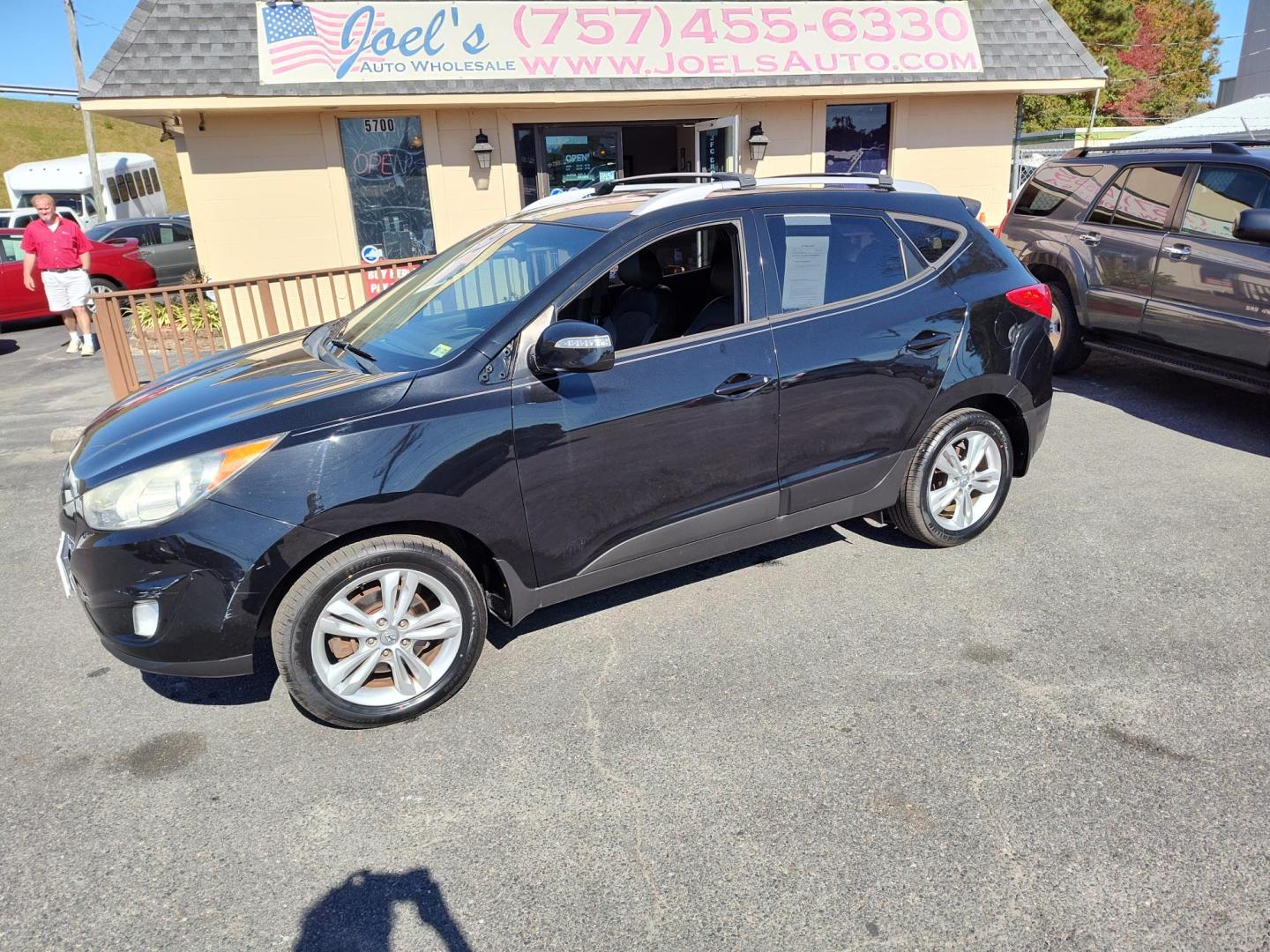 2013 Black Hyundai Tucson Limited 2WD (KM8JU3ACXDU) with an 2.4L L4 DOHC 16V engine, 6-Speed Automatic transmission, located at 5700 Curlew Drive, Norfolk, VA, 23502, (757) 455-6330, 36.841885, -76.209412 - Photo#0