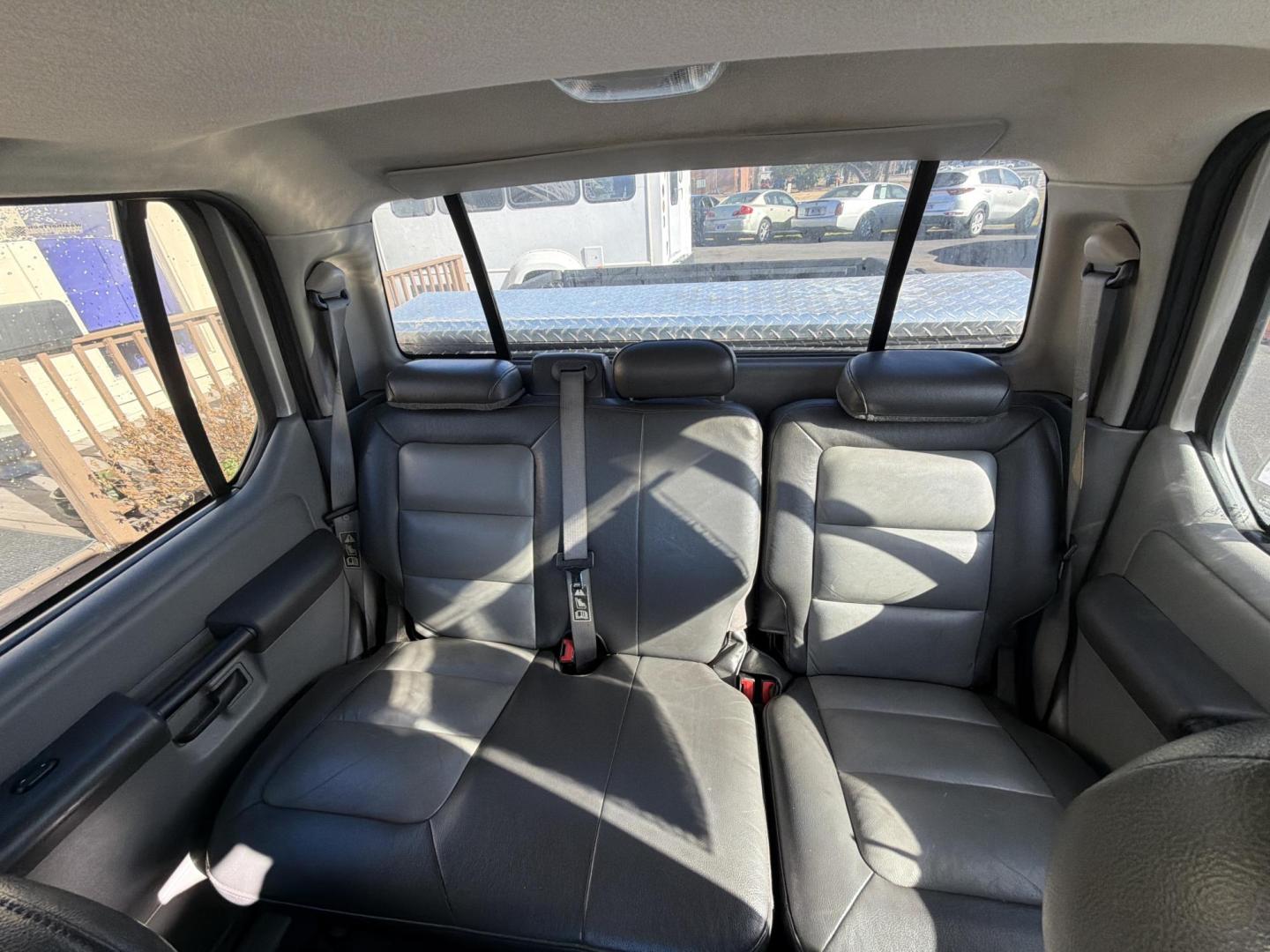 2003 Silver Ford Explorer Sport Trac XLS 4WD (1FMZU77E93U) with an 4.0L V6 SOHC 12V engine, automatic transmission, located at 5700 Curlew Drive, Norfolk, VA, 23502, (757) 455-6330, 36.841885, -76.209412 - Photo#8