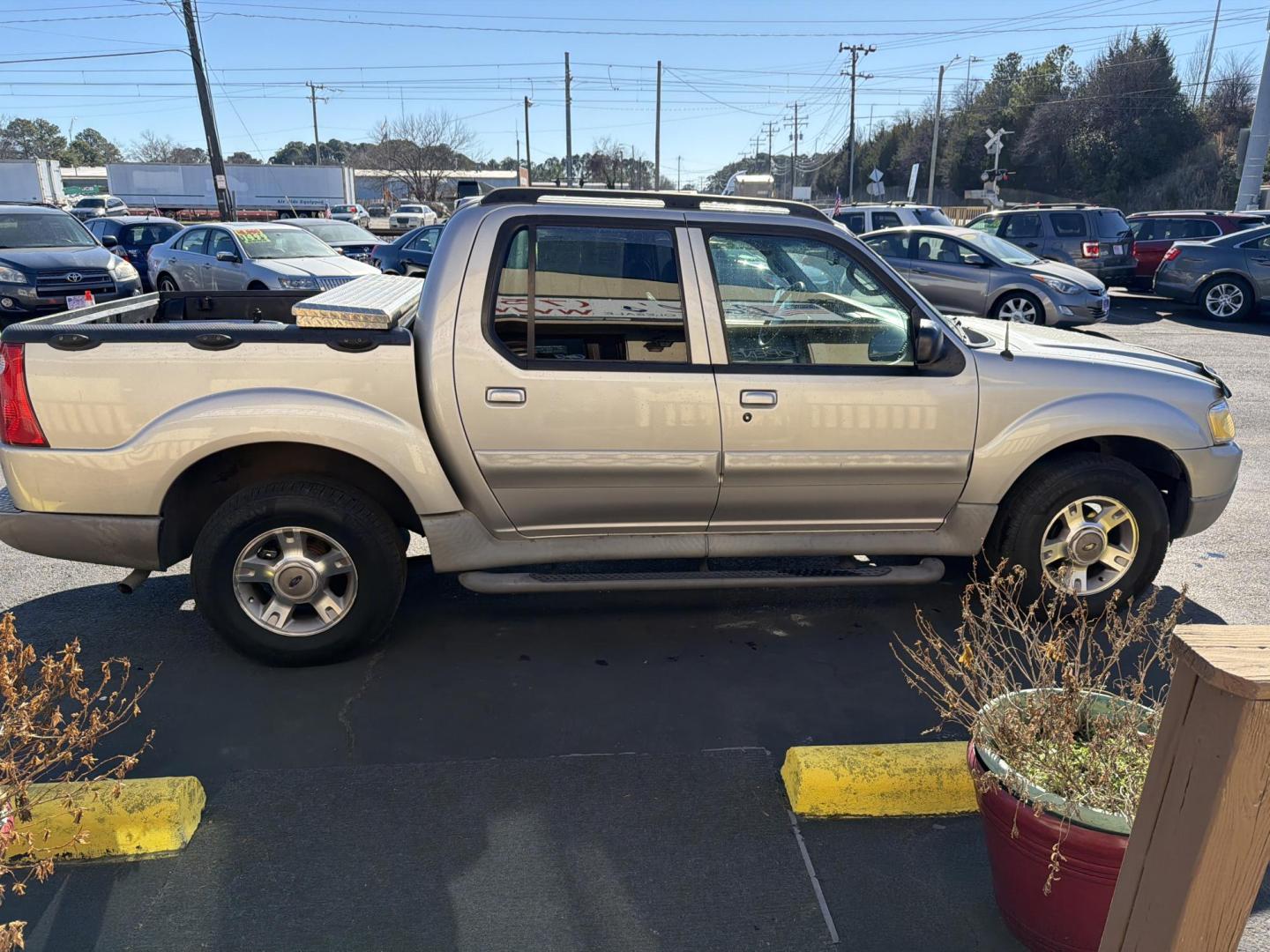 2003 Silver Ford Explorer Sport Trac XLS 4WD (1FMZU77E93U) with an 4.0L V6 SOHC 12V engine, automatic transmission, located at 5700 Curlew Drive, Norfolk, VA, 23502, (757) 455-6330, 36.841885, -76.209412 - Photo#3