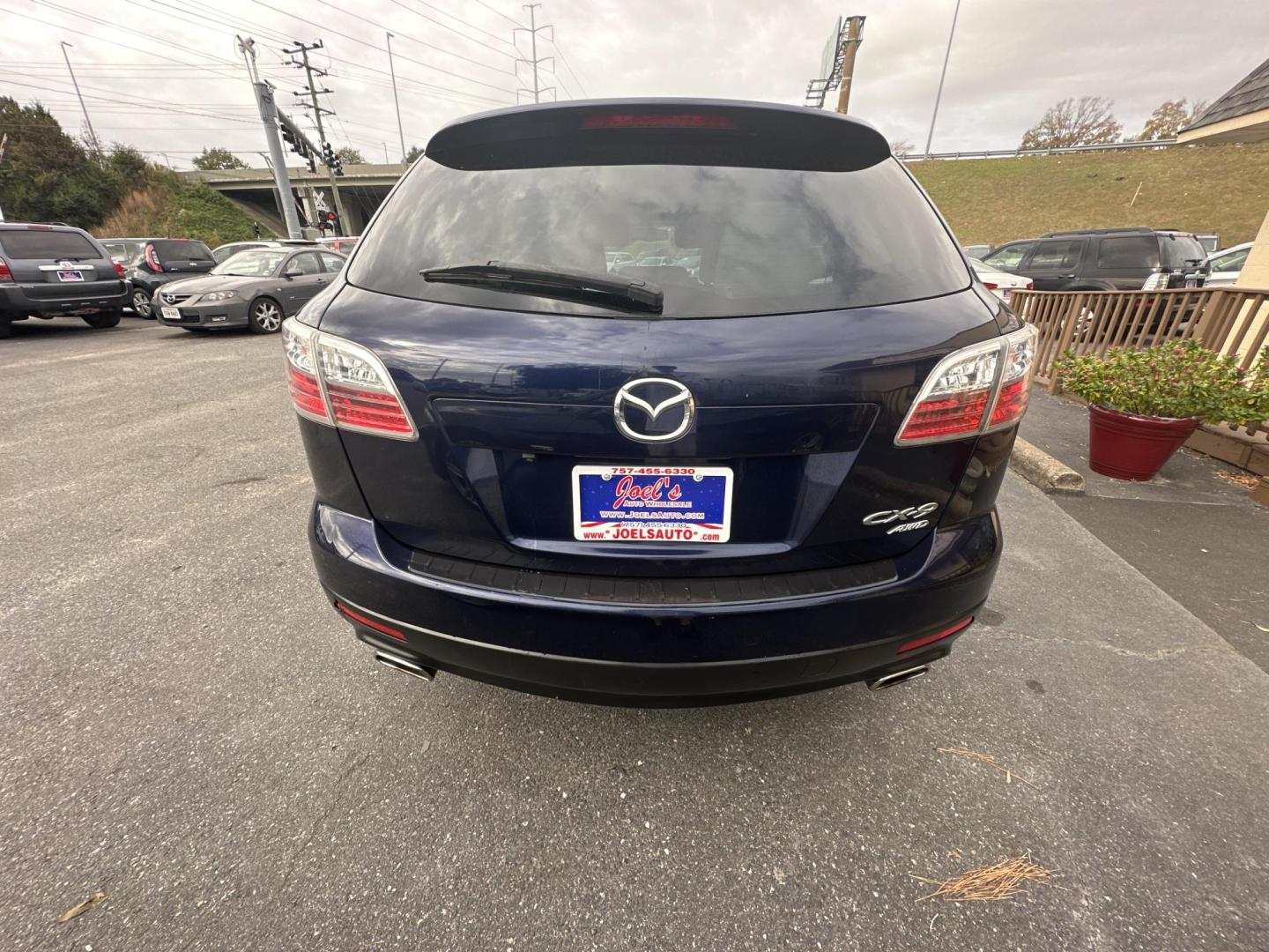 2012 Blue Mazda CX-9 Sport AWD (JM3TB3BV0C0) with an 3.7L V6 DOHC 24V engine, 6-Speed Automatic transmission, located at 5700 Curlew Drive, Norfolk, VA, 23502, (757) 455-6330, 36.841885, -76.209412 - Photo#2