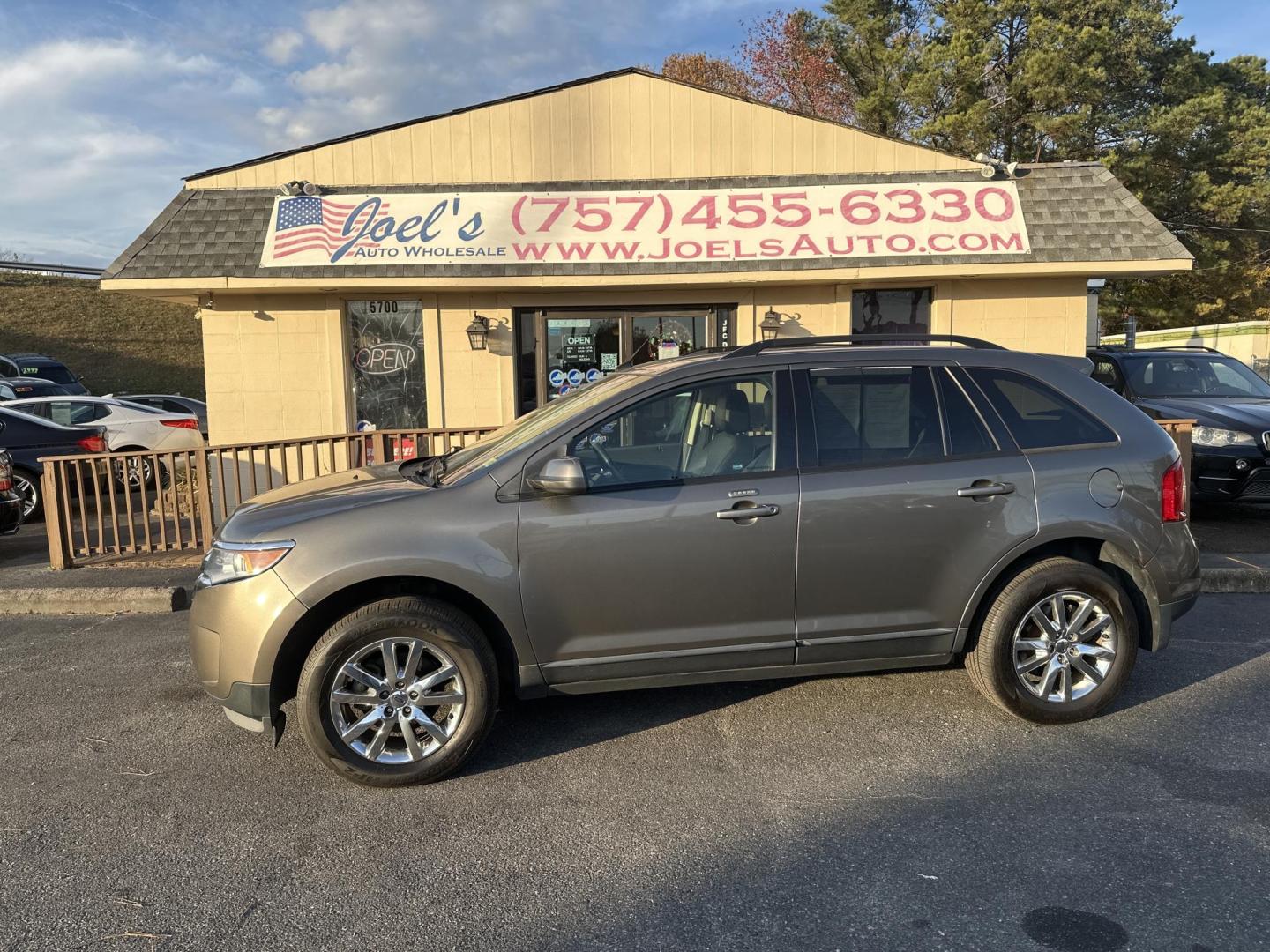 2014 Green Ford Edge SEL FWD (2FMDK3JC8EB) with an 3.5L V6 DOHC 24V engine, 6-Speed Automatic transmission, located at 5700 Curlew Drive, Norfolk, VA, 23502, (757) 455-6330, 36.841885, -76.209412 - Photo#0