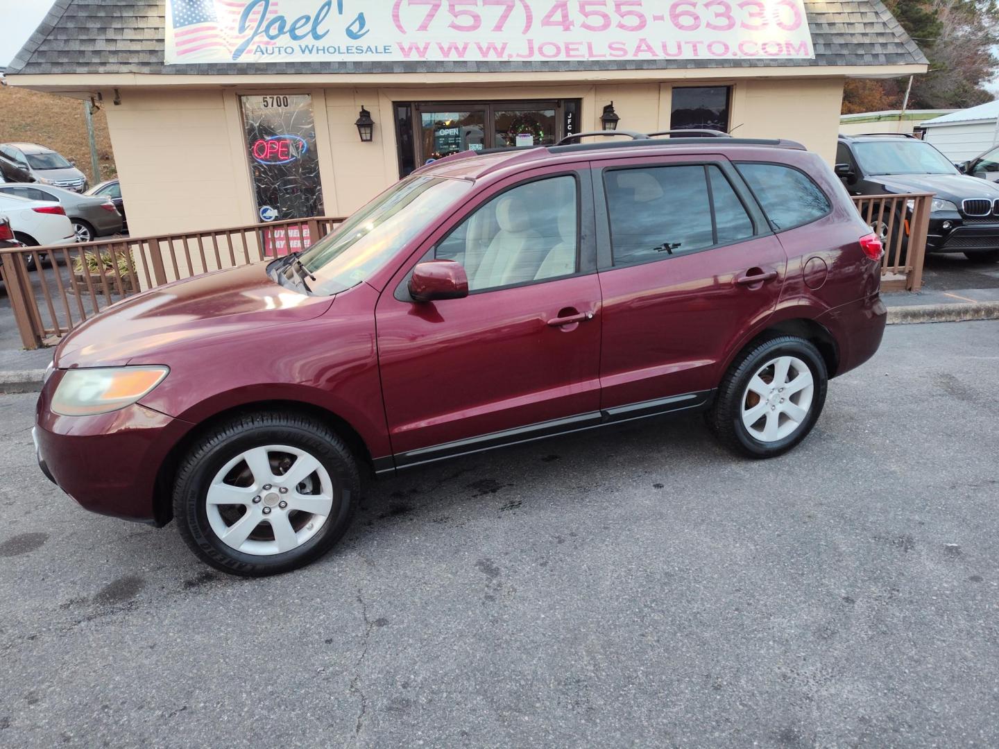 2007 Red Hyundai Santa Fe Limited (5NMSH13E67H) with an 3.3L V6 DOHC 24V engine, 5-Speed Automatic Overdrive transmission, located at 5700 Curlew Drive, Norfolk, VA, 23502, (757) 455-6330, 36.841885, -76.209412 - Photo#0