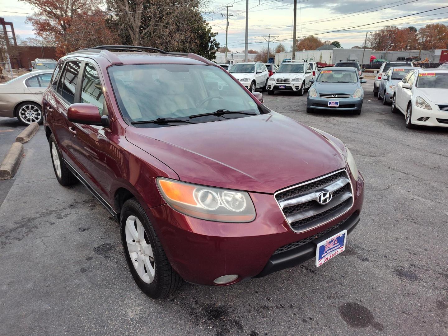 2007 Red Hyundai Santa Fe Limited (5NMSH13E67H) with an 3.3L V6 DOHC 24V engine, 5-Speed Automatic Overdrive transmission, located at 5700 Curlew Drive, Norfolk, VA, 23502, (757) 455-6330, 36.841885, -76.209412 - Photo#4