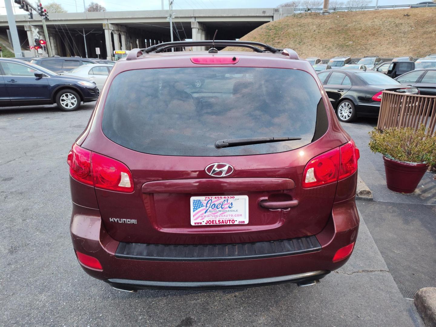 2007 Red Hyundai Santa Fe Limited (5NMSH13E67H) with an 3.3L V6 DOHC 24V engine, 5-Speed Automatic Overdrive transmission, located at 5700 Curlew Drive, Norfolk, VA, 23502, (757) 455-6330, 36.841885, -76.209412 - Photo#13