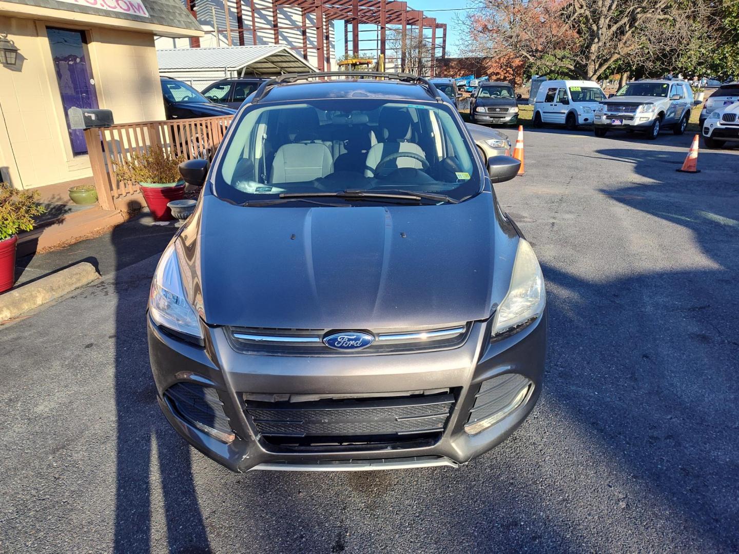 2013 Gray Ford Escape SE AWD (1FMCU9GX1DU) with an 1.6L L4 DOHC 16V engine, 6-Speed Automatic transmission, located at 5700 Curlew Drive, Norfolk, VA, 23502, (757) 455-6330, 36.841885, -76.209412 - Photo#2