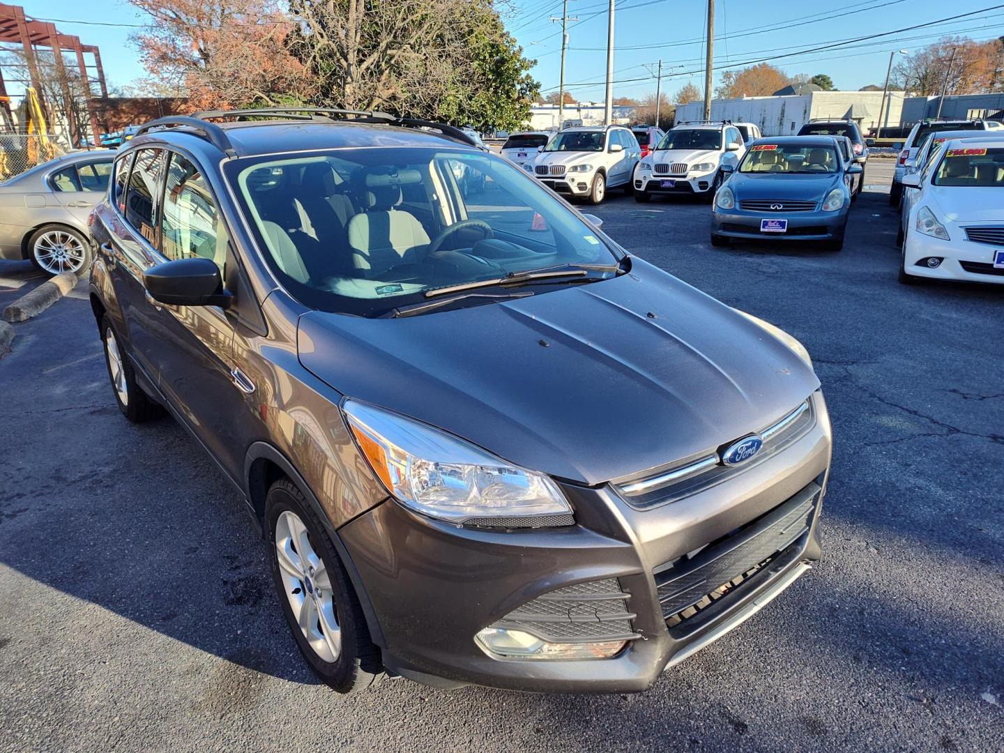 2013 Gray Ford Escape SE AWD (1FMCU9GX1DU) with an 1.6L L4 DOHC 16V engine, 6-Speed Automatic transmission, located at 5700 Curlew Drive, Norfolk, VA, 23502, (757) 455-6330, 36.841885, -76.209412 - Photo#4