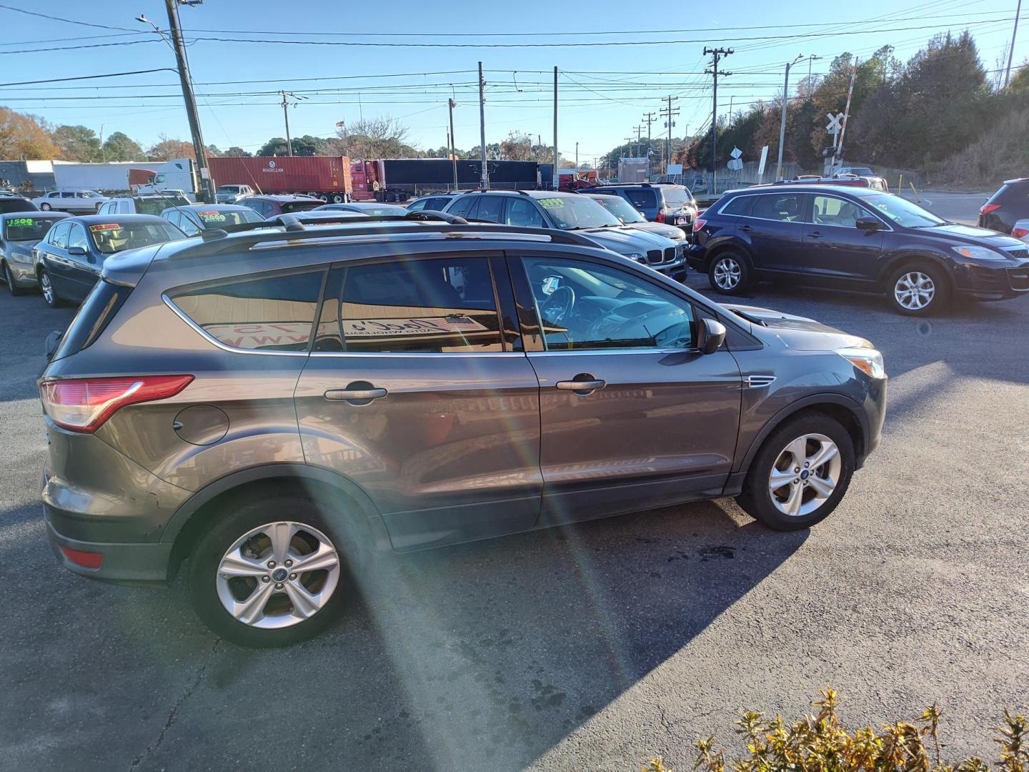 2013 Gray Ford Escape SE AWD (1FMCU9GX1DU) with an 1.6L L4 DOHC 16V engine, 6-Speed Automatic transmission, located at 5700 Curlew Drive, Norfolk, VA, 23502, (757) 455-6330, 36.841885, -76.209412 - Photo#15