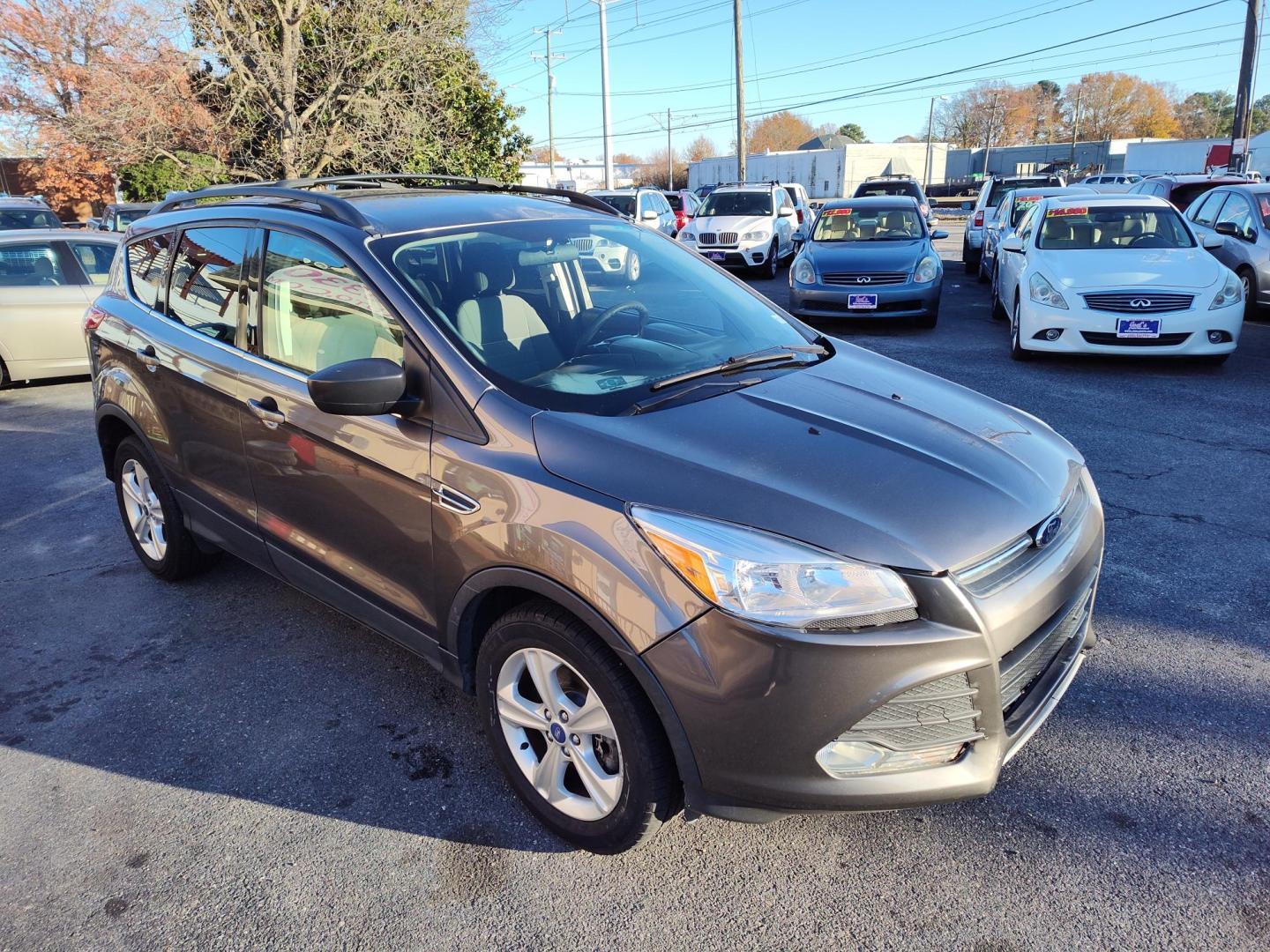 2013 Gray Ford Escape SE AWD (1FMCU9GX1DU) with an 1.6L L4 DOHC 16V engine, 6-Speed Automatic transmission, located at 5700 Curlew Drive, Norfolk, VA, 23502, (757) 455-6330, 36.841885, -76.209412 - Photo#17