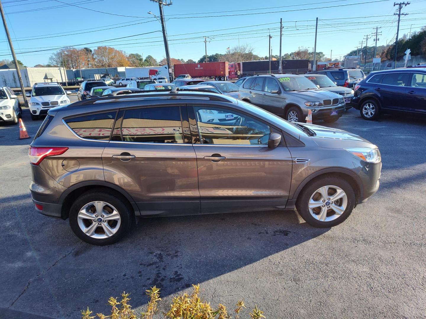 2013 Gray Ford Escape SE AWD (1FMCU9GX1DU) with an 1.6L L4 DOHC 16V engine, 6-Speed Automatic transmission, located at 5700 Curlew Drive, Norfolk, VA, 23502, (757) 455-6330, 36.841885, -76.209412 - Photo#16