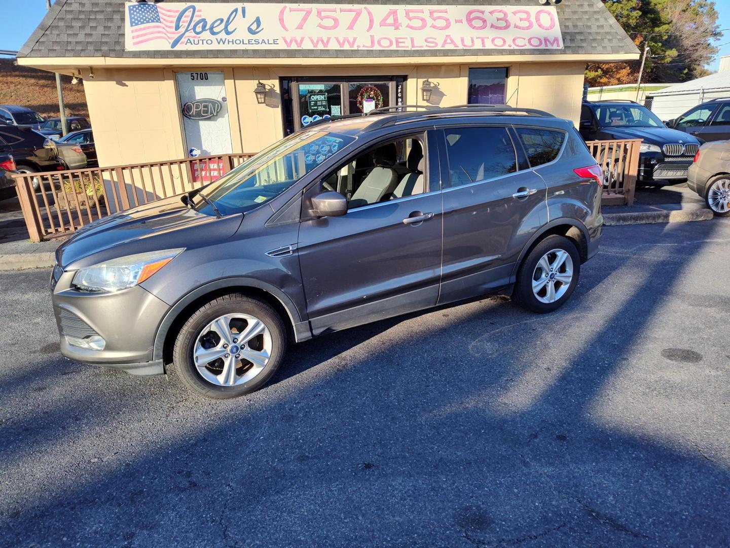 2013 Gray Ford Escape SE AWD (1FMCU9GX1DU) with an 1.6L L4 DOHC 16V engine, 6-Speed Automatic transmission, located at 5700 Curlew Drive, Norfolk, VA, 23502, (757) 455-6330, 36.841885, -76.209412 - Photo#1