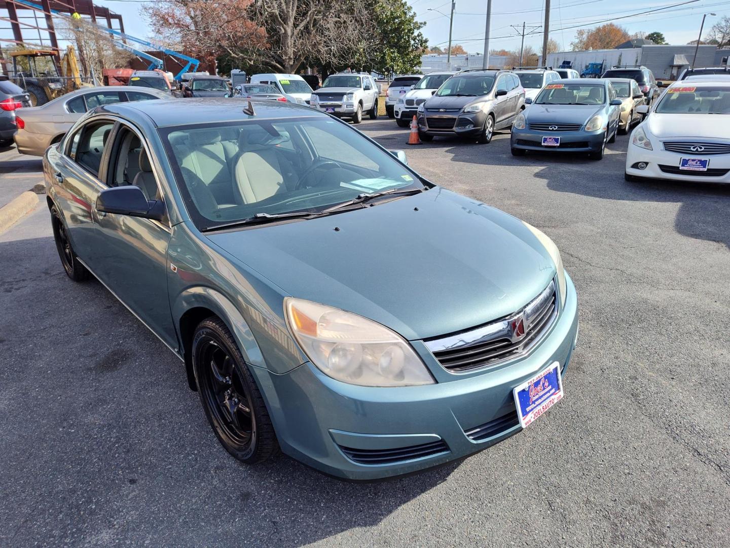 2009 Green Saturn Aura XE (1G8ZS57B49F) with an 2.4L L4 DOHC 16V engine, 4-Speed Automatic Overdrive transmission, located at 5700 Curlew Drive, Norfolk, VA, 23502, (757) 455-6330, 36.841885, -76.209412 - Photo#4